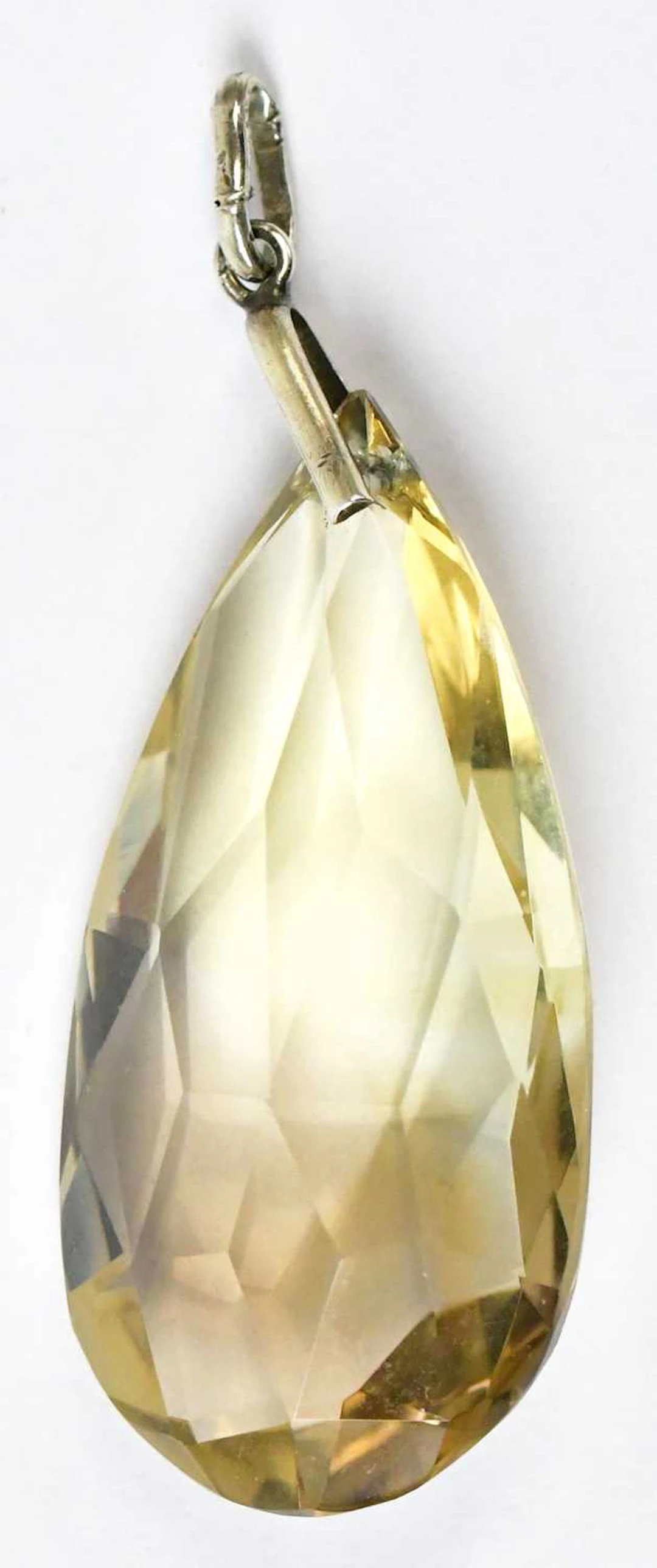A large c.1970s facet cut pear-shaped citrine pendant