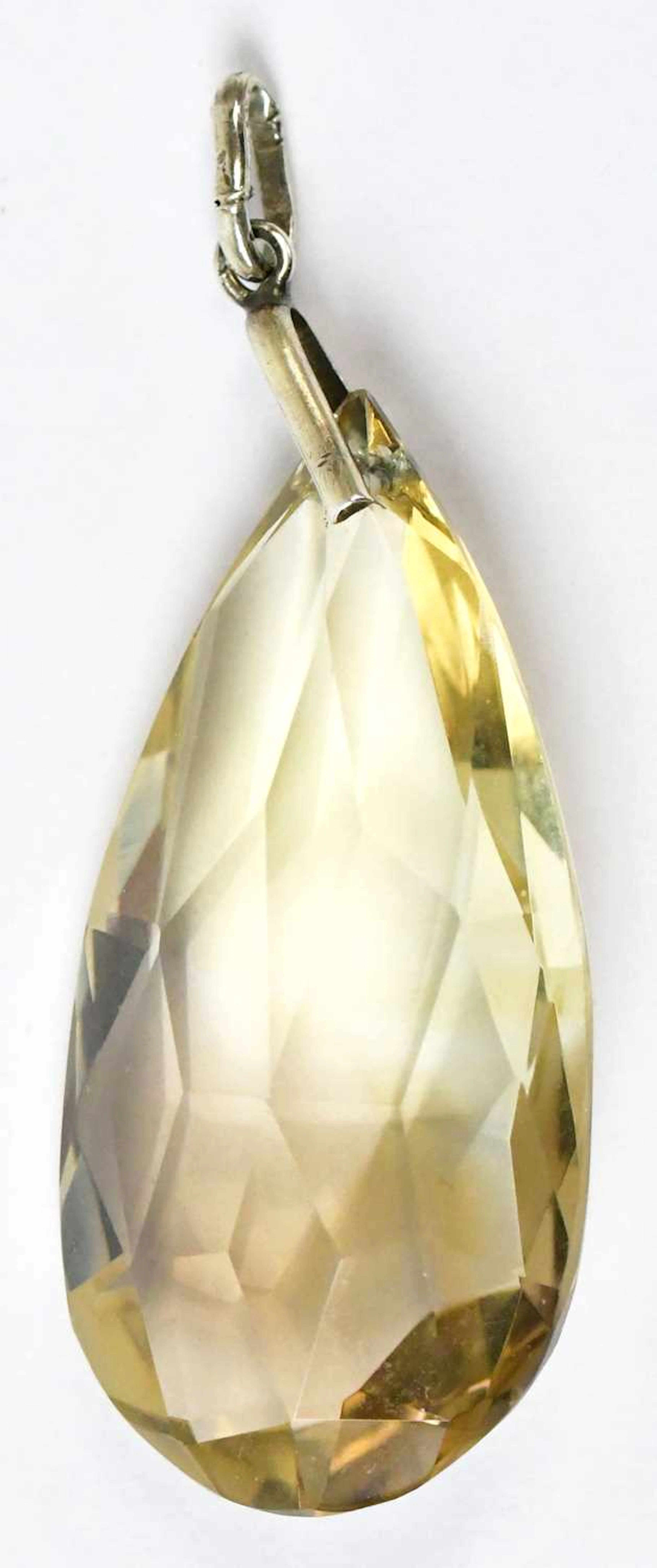 A large c.1970s facet cut pear-shaped citrine pendant