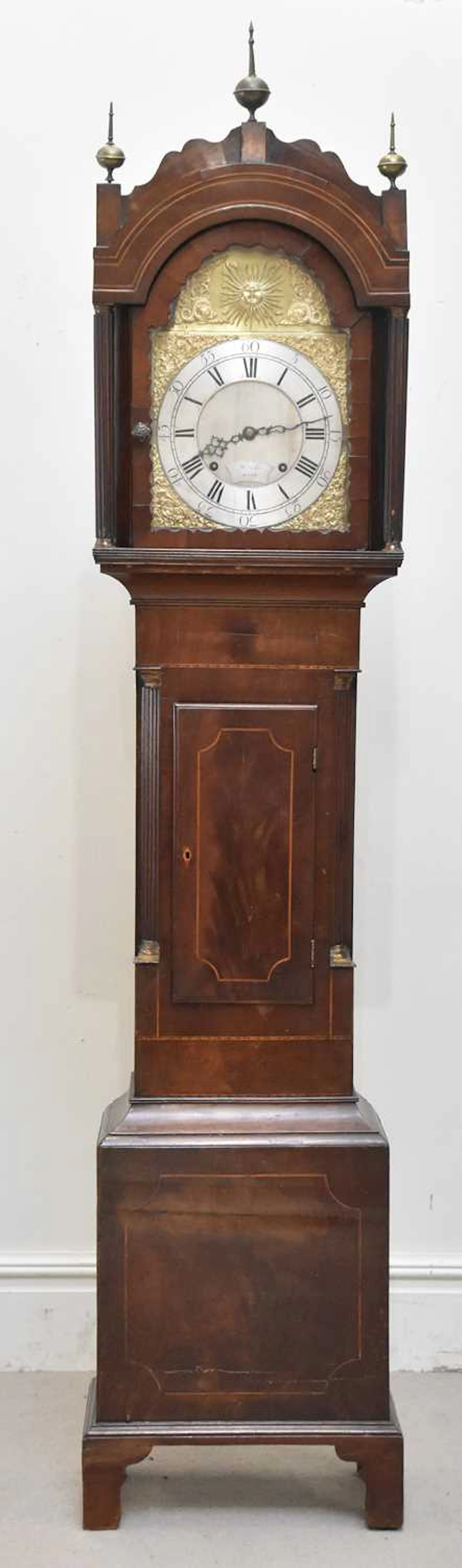 A 19th century eight day longcase clock in mahogany case
