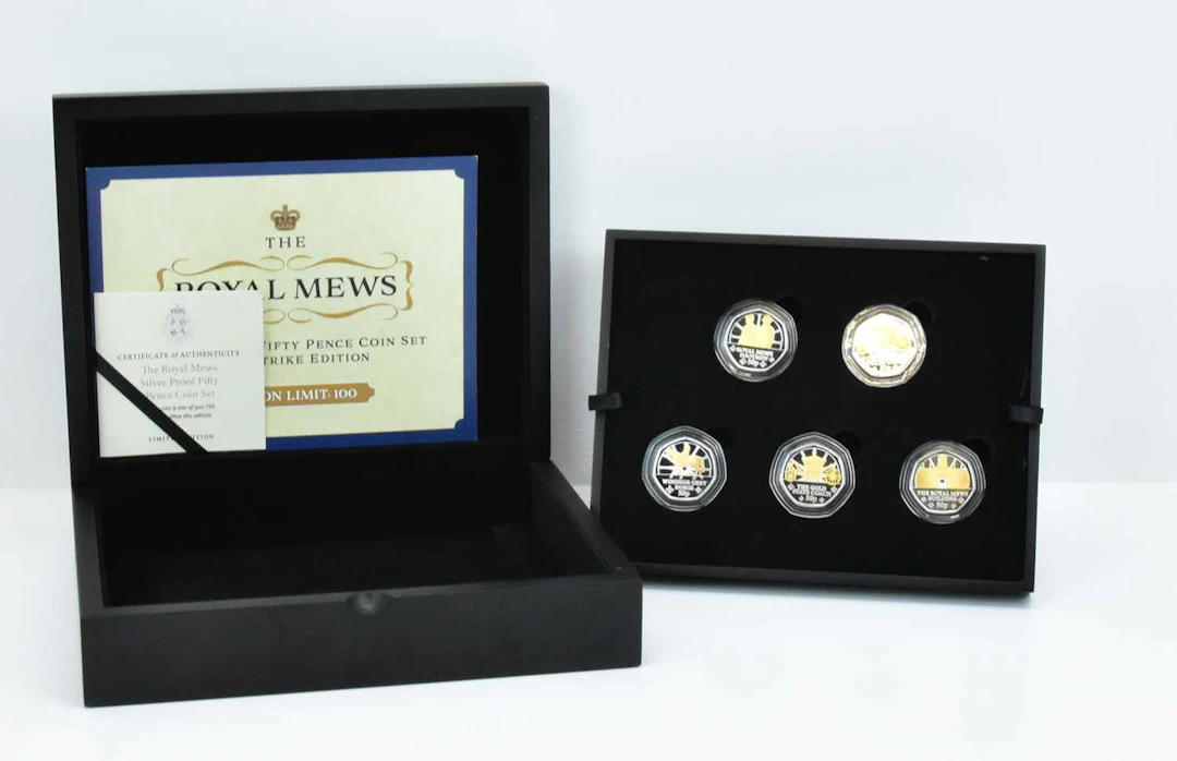 TOWER MINT LTD; 'The Royal Mews' silver proof fifty pence five-coin set