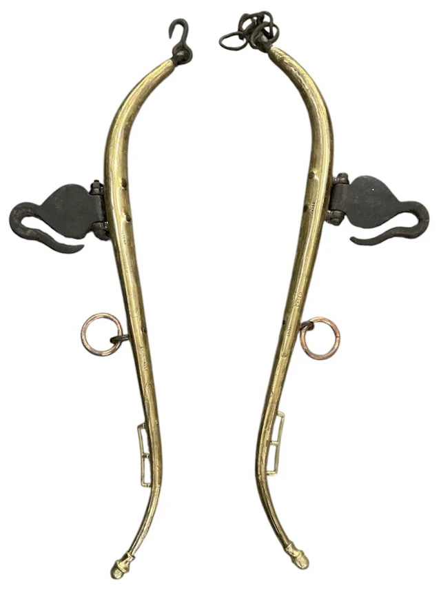 A pair of Victorian patent solid brass horse carriage rein mats