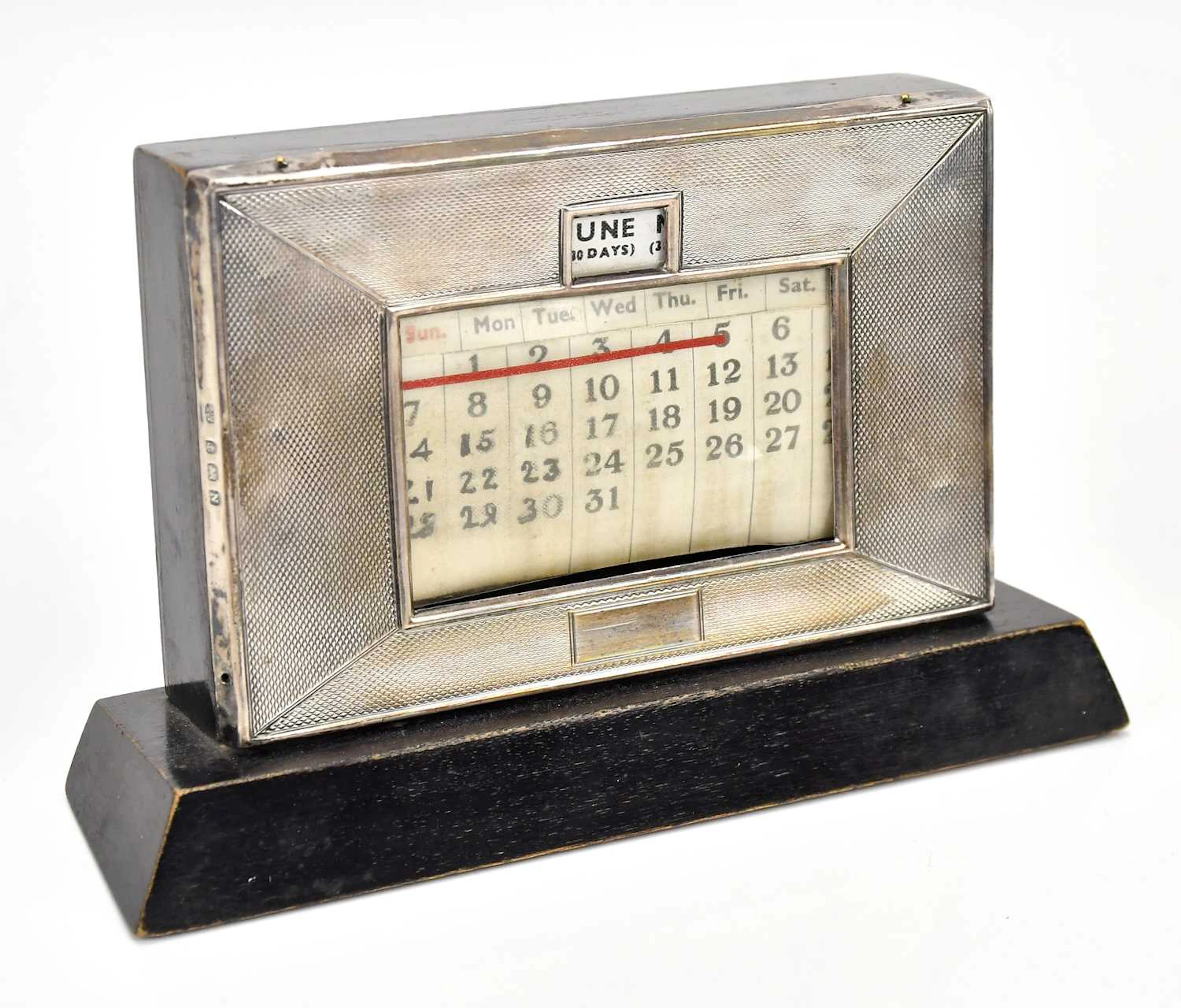 W J MYATT & CO; a George VI hallmarked silver perpetual calendar