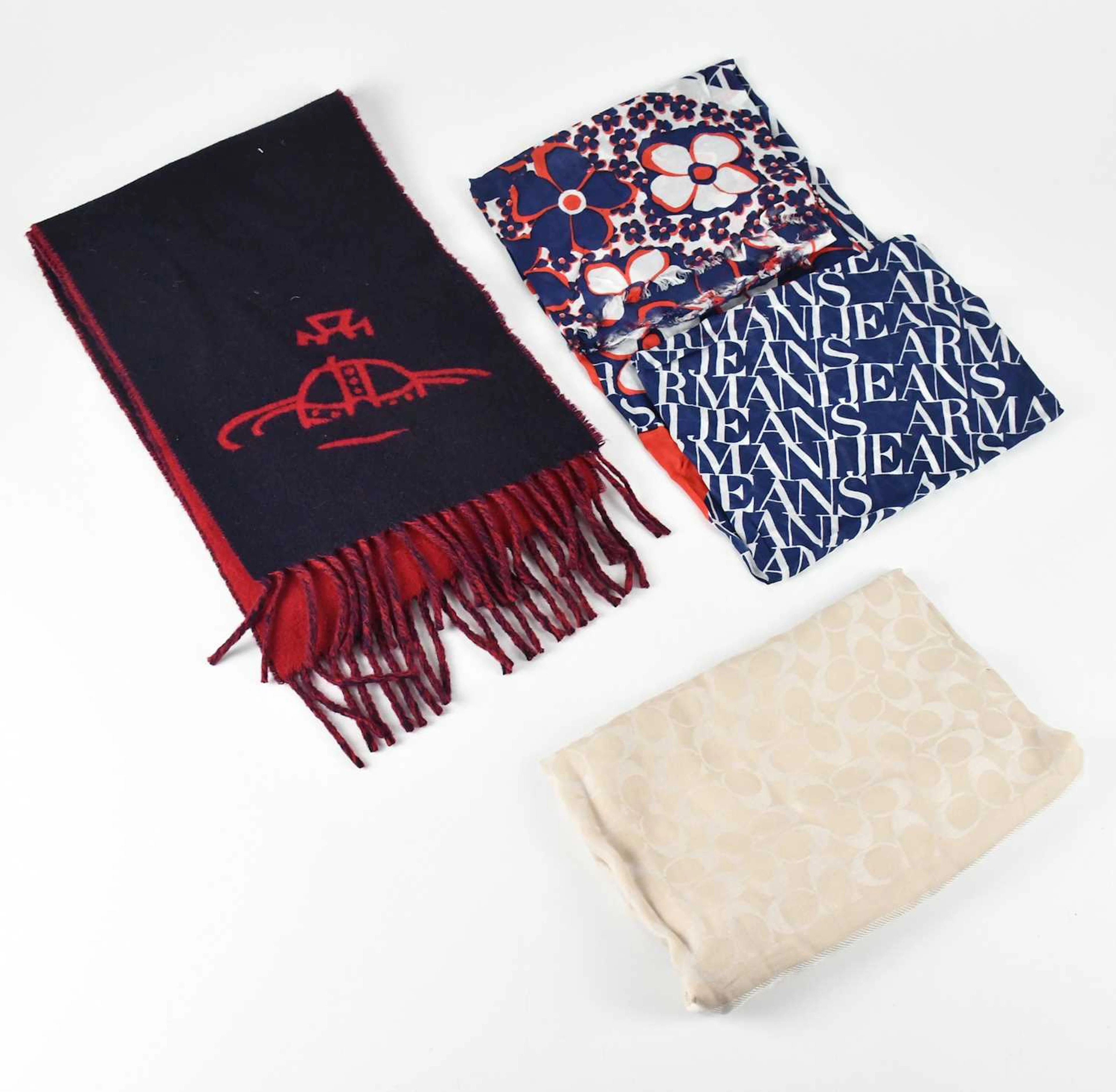 COACH; a tan and cream wool square scarf with brand logo