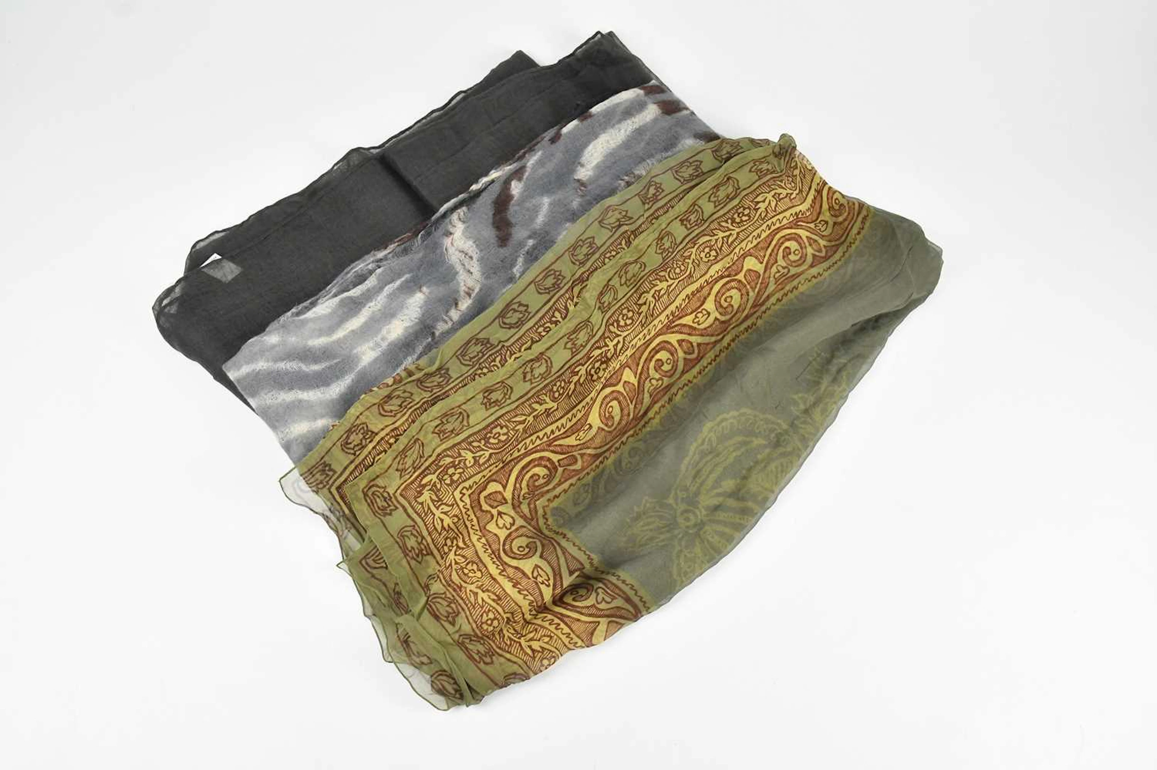 HERMÈS; a 100% fine cashmere olive green long scarf with hand stitched edges