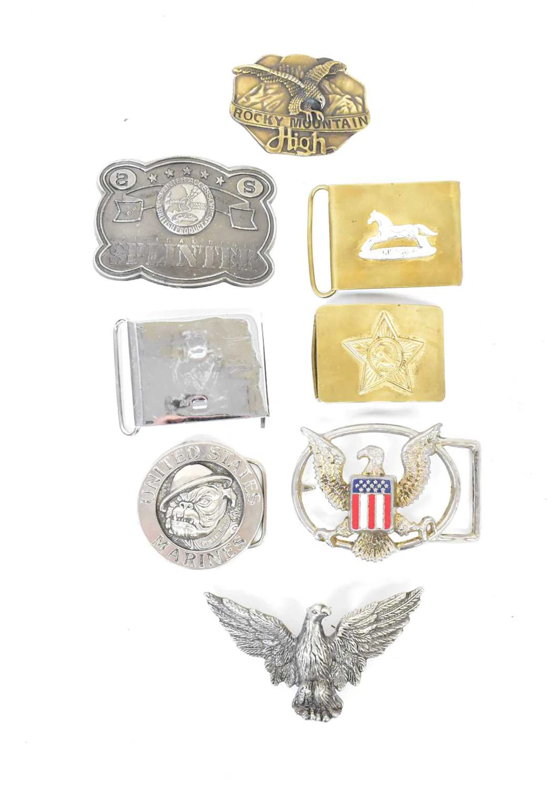 A collection of metal collector's belt buckles