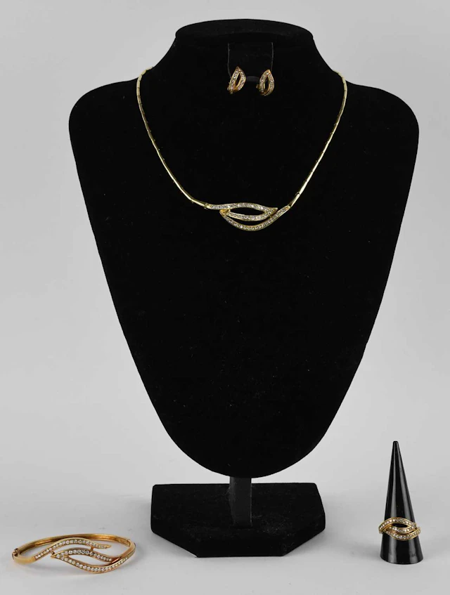 A suite of 18ct yellow gold diamond set jewellery