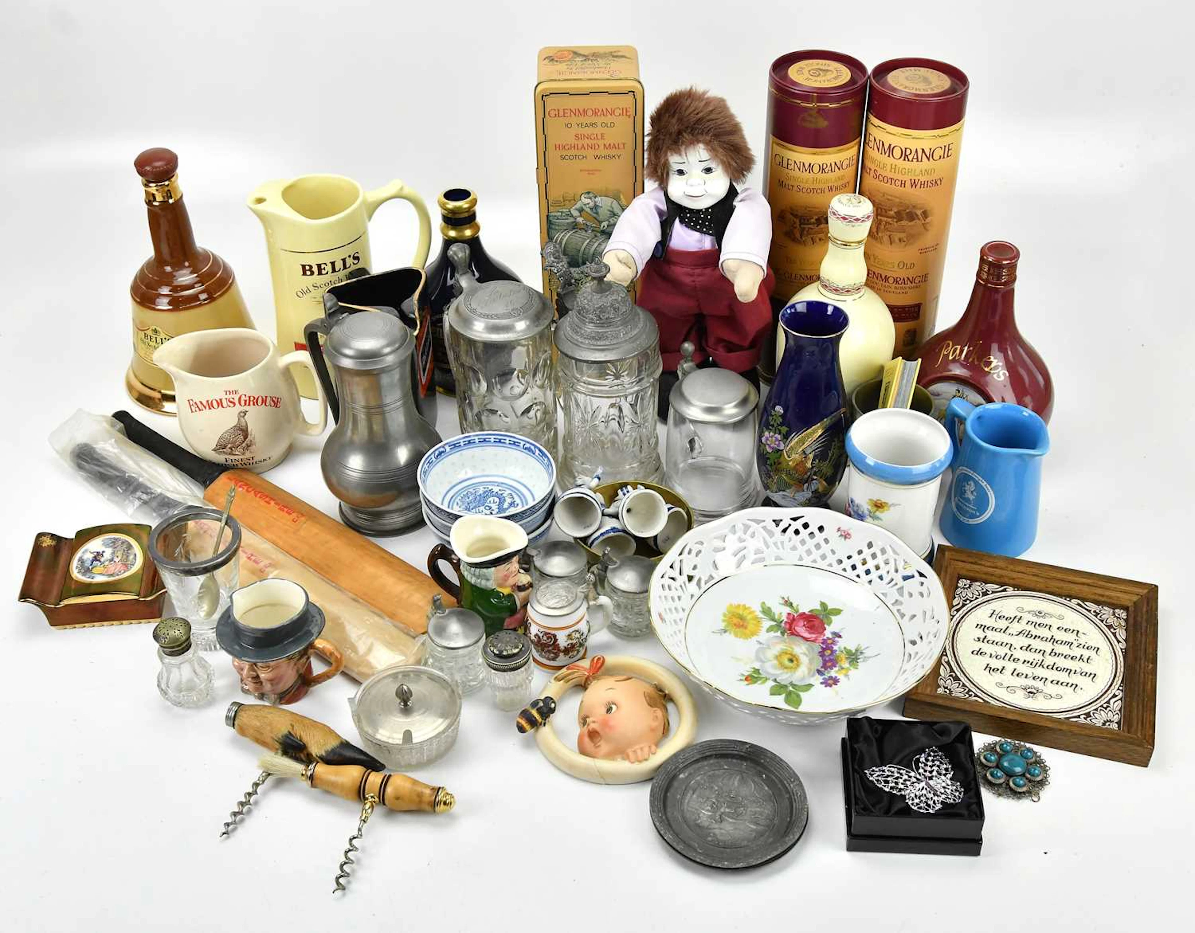 A quantity of collectors' items including whisky jugs