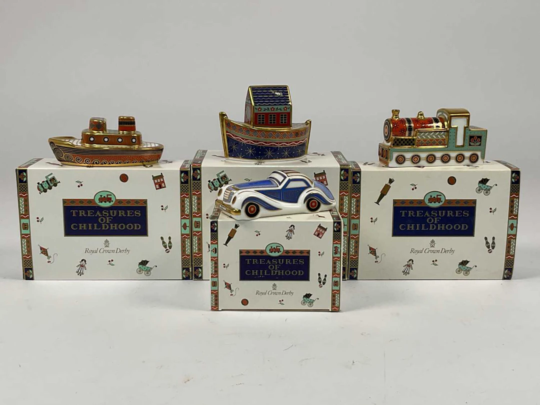 ROYAL CROWN DERBY; 'Treasures of Childhood' porcelain models