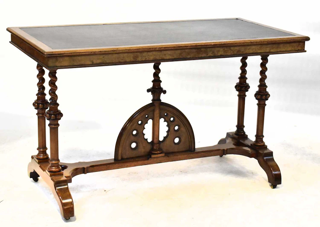 A Victorian walnut Gothic hall / library table