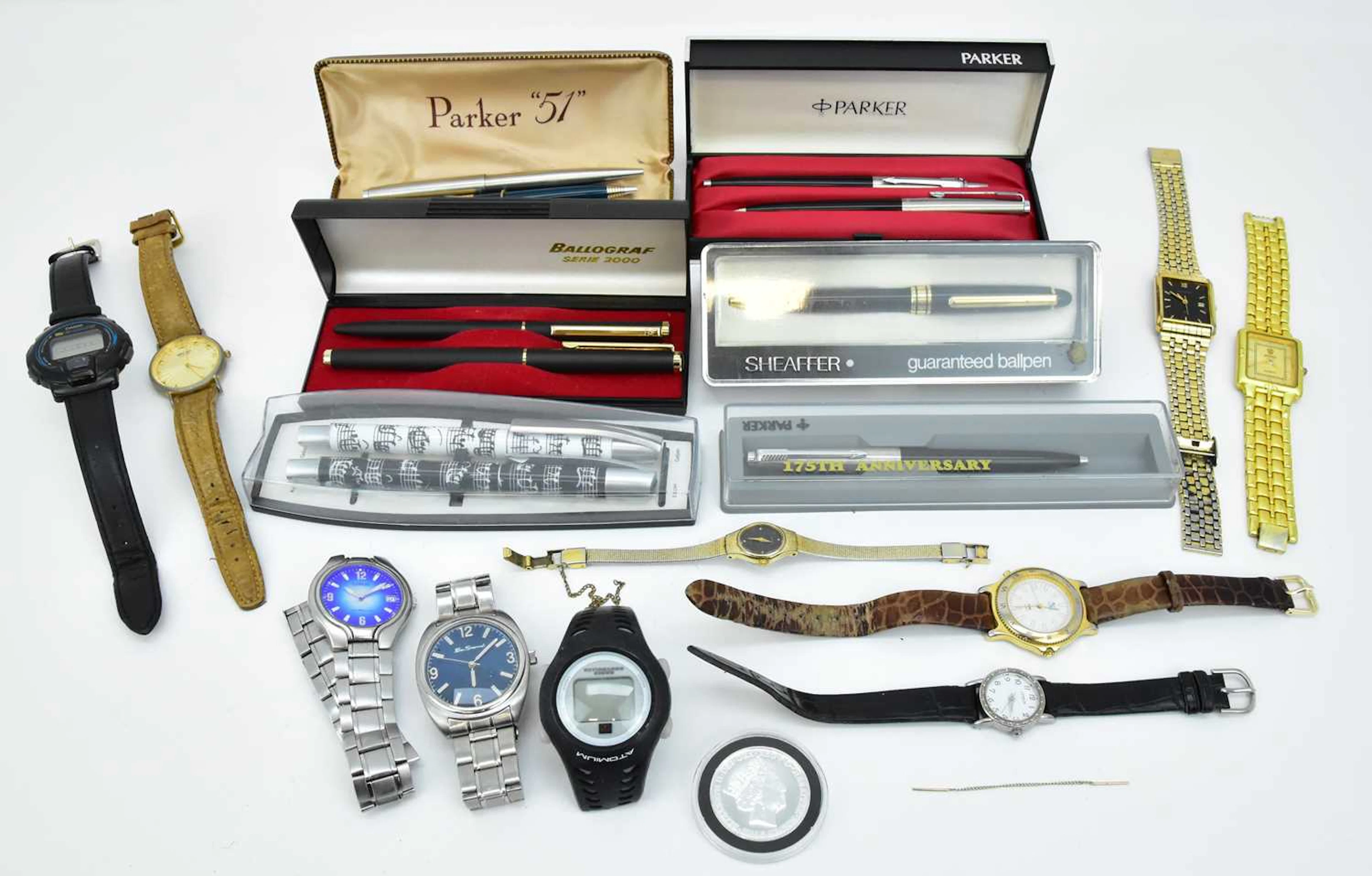 A group of fountain and ballpoint pens including Parker 51