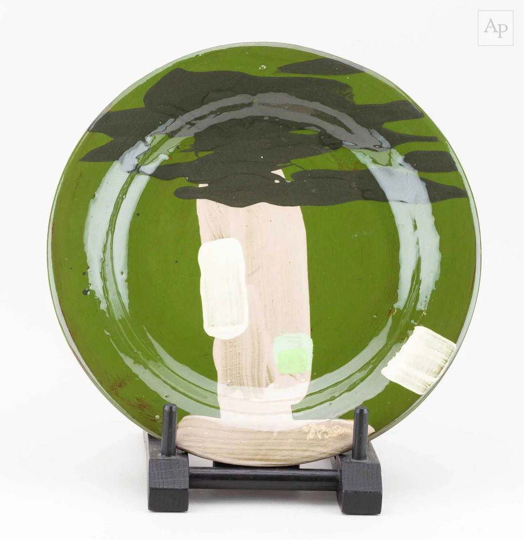 BRUCE McLEAN (born 1944); a large earthenware plate with...