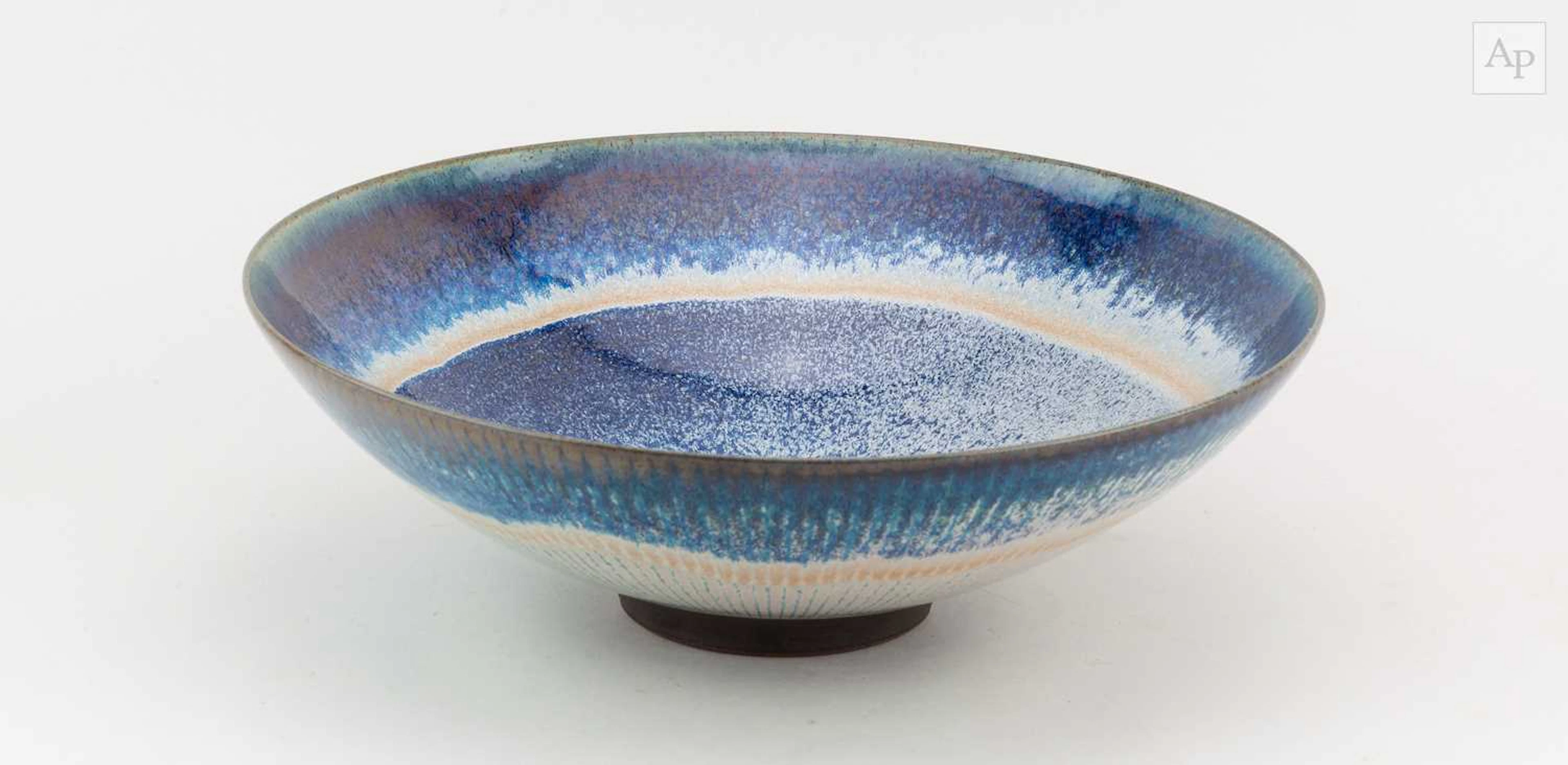 PETER SPARREY (born 1967); a large stoneware bowl covered in rutile glaze