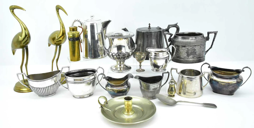 Various items of metalware including two large brass flamingos