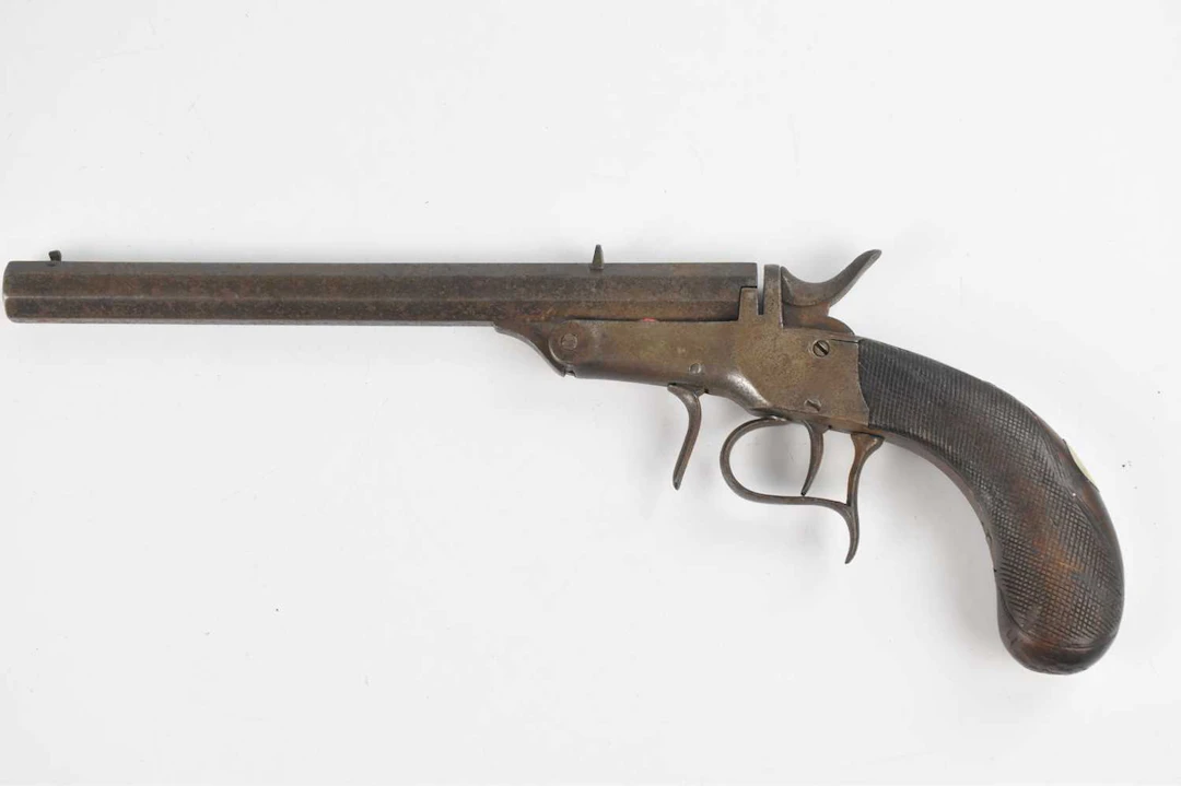 A 19th century percussion cap pistol