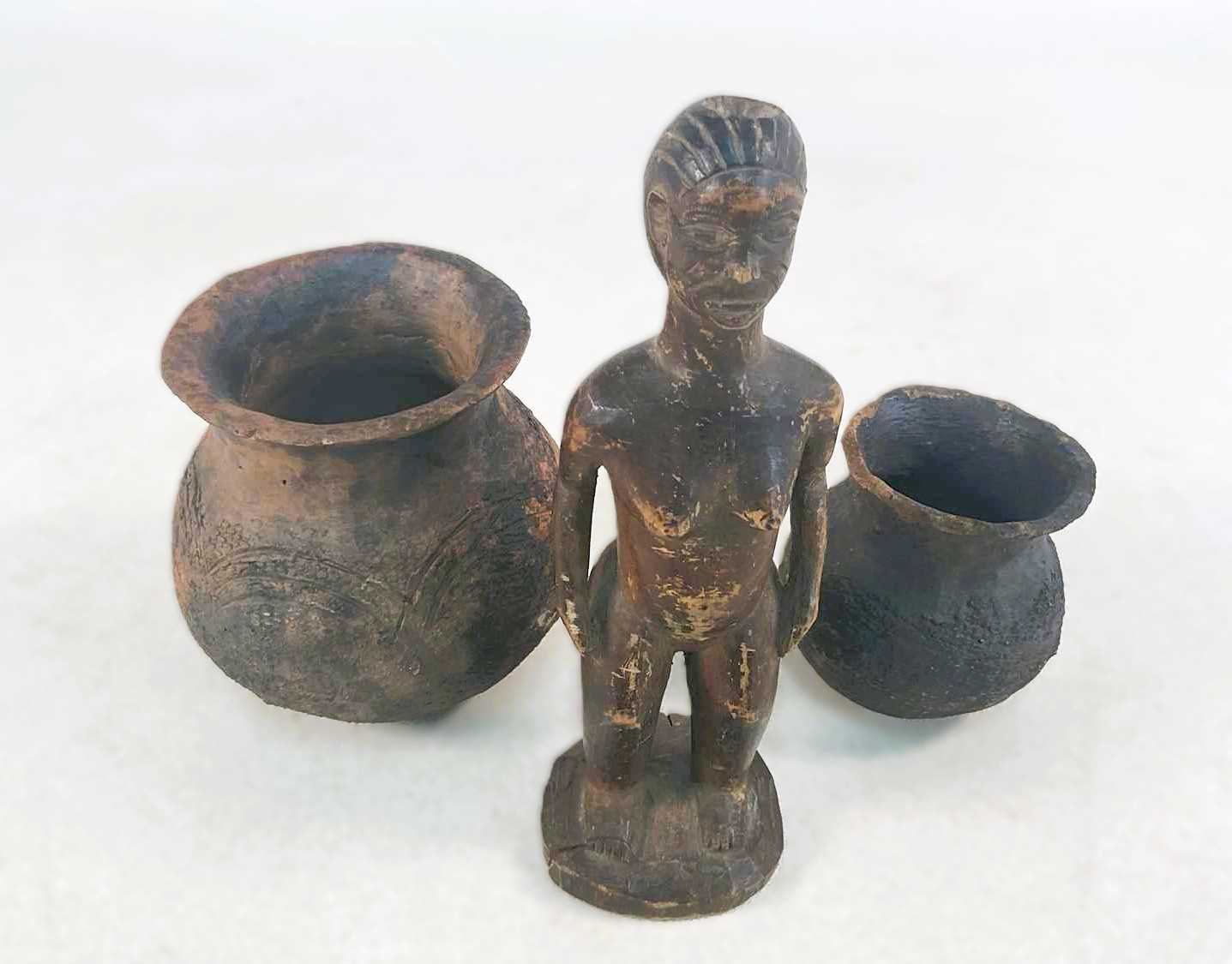 An African hardwood figure of a woman