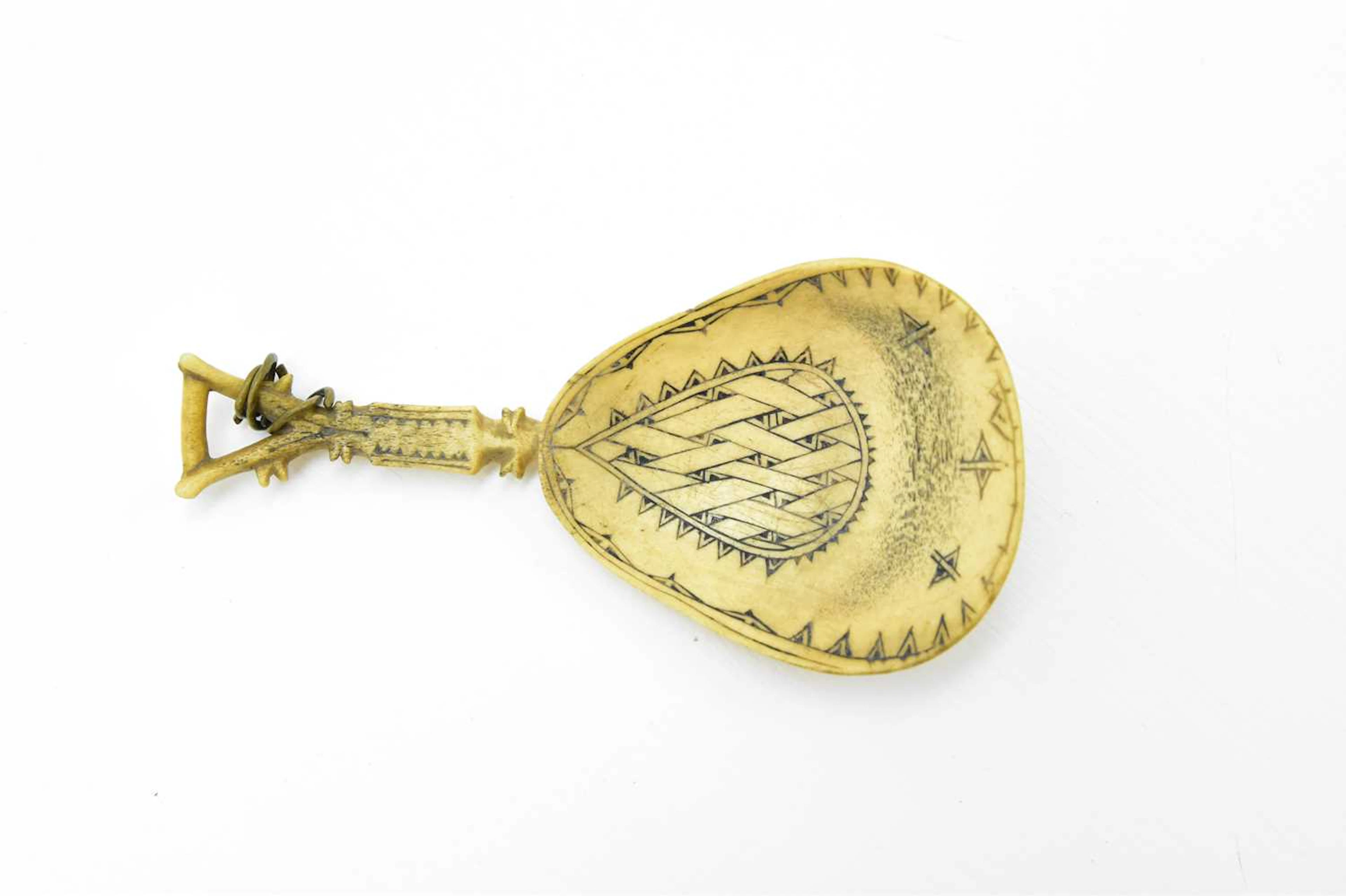 An antique Scandinavian Sami reindeer antler spoon