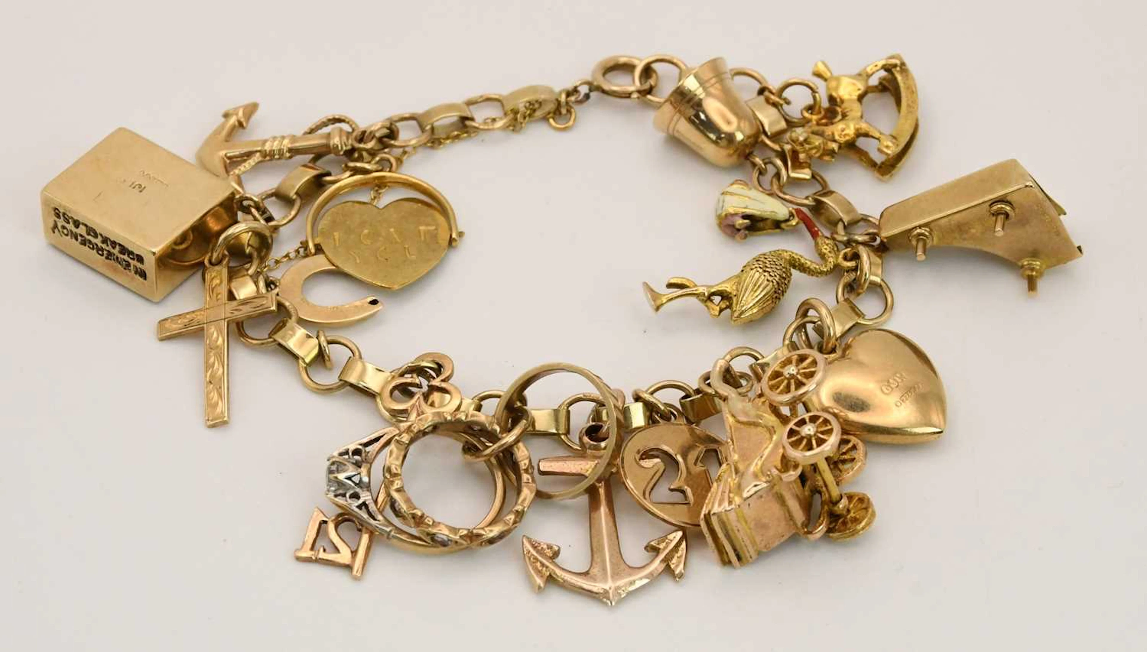 A 9ct yellow gold charm bracelet