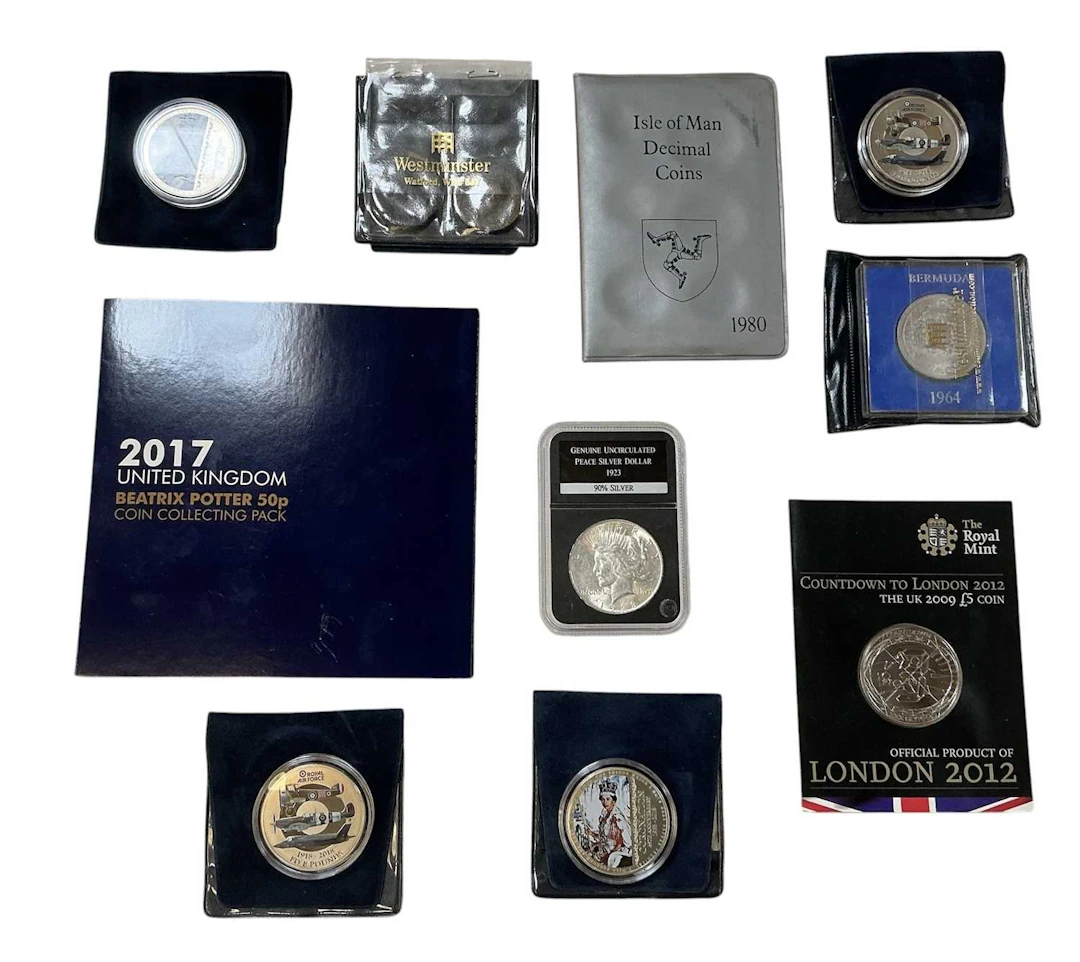A quantity of assorted silver and other coins