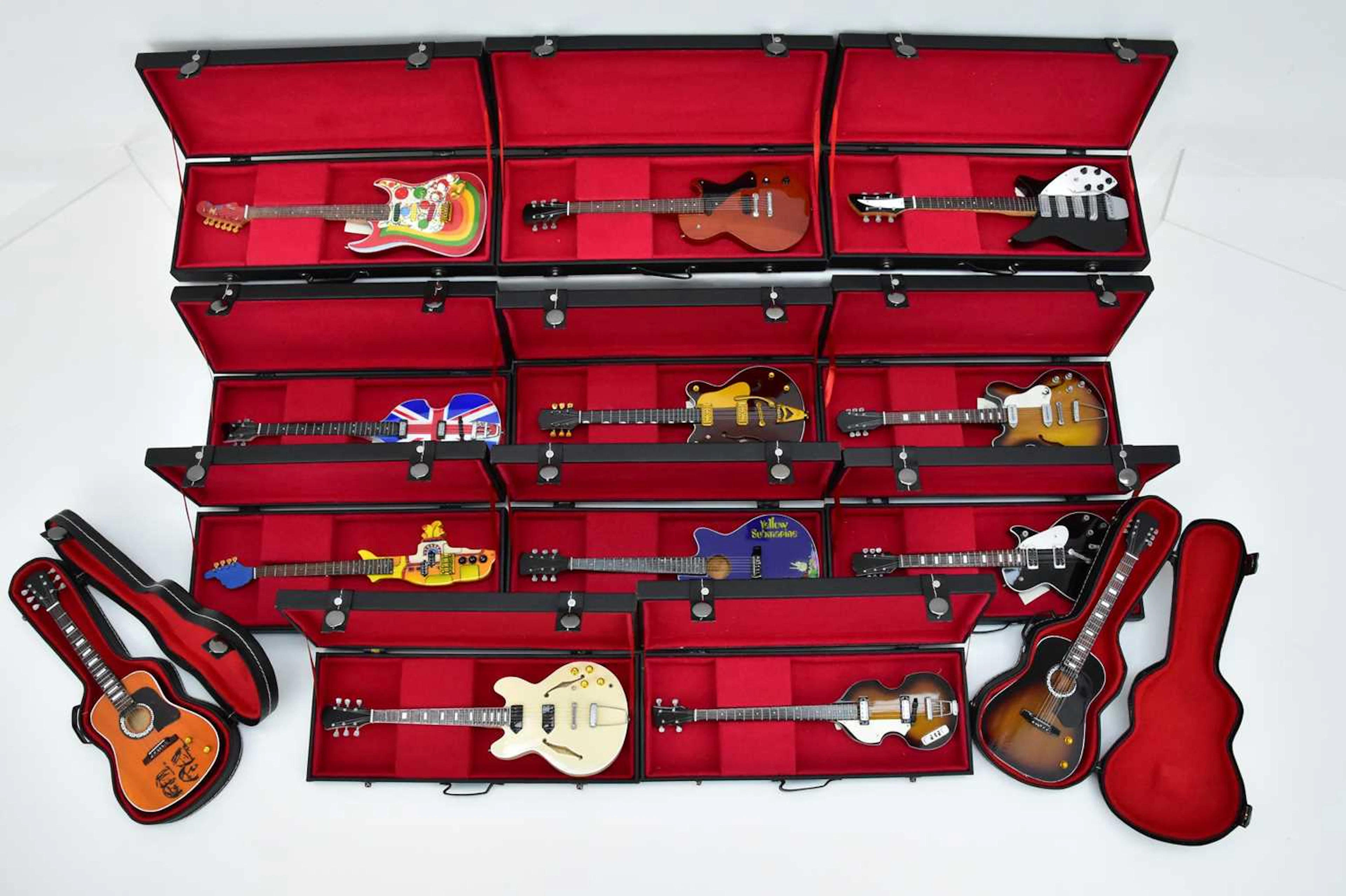 THE BEATLES; a collection of thirteen miniature 1:4 scale...