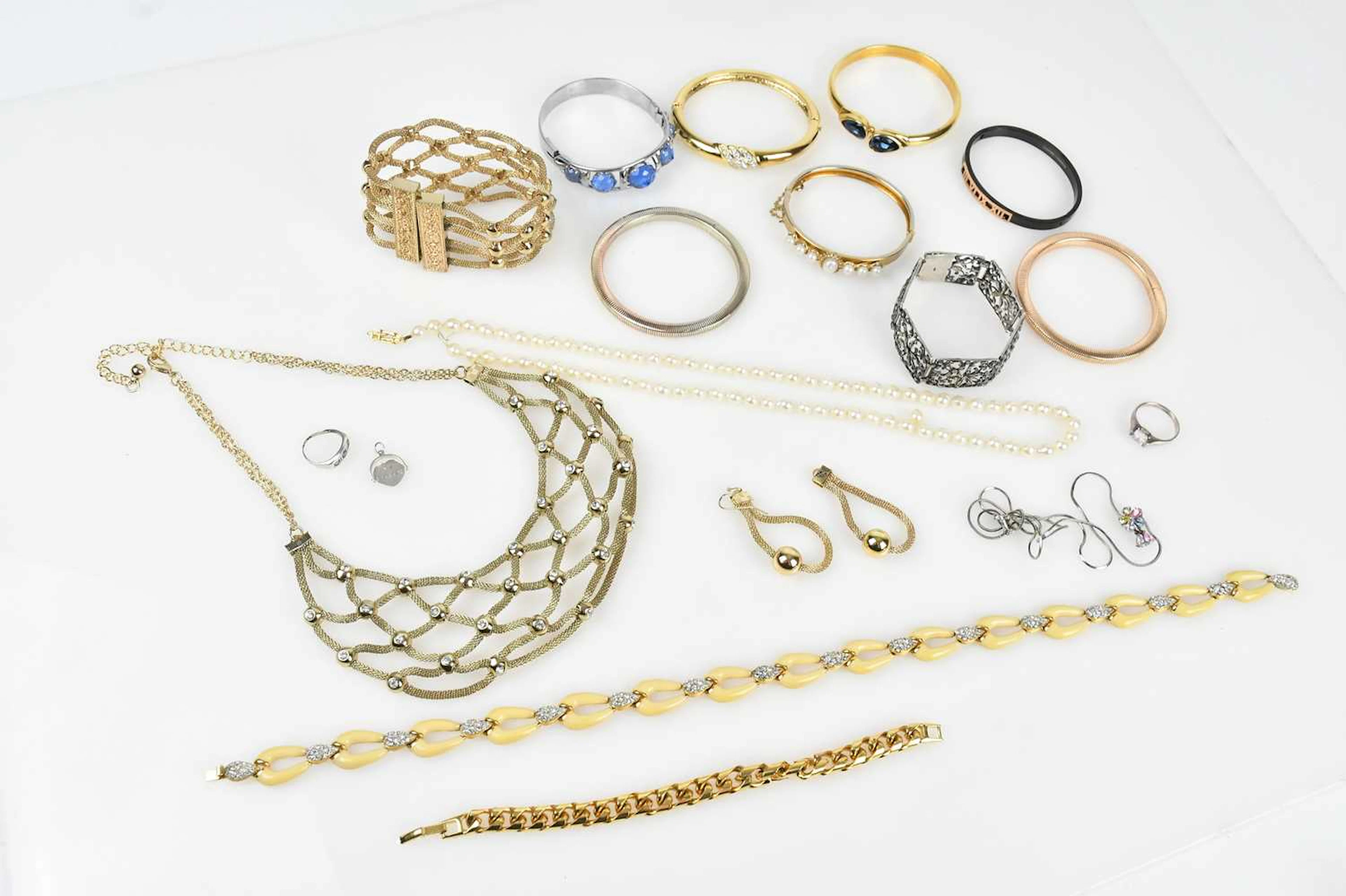 SERENA WILLIAMS; a gold tone heavy mesh bracelet set with rhinestones