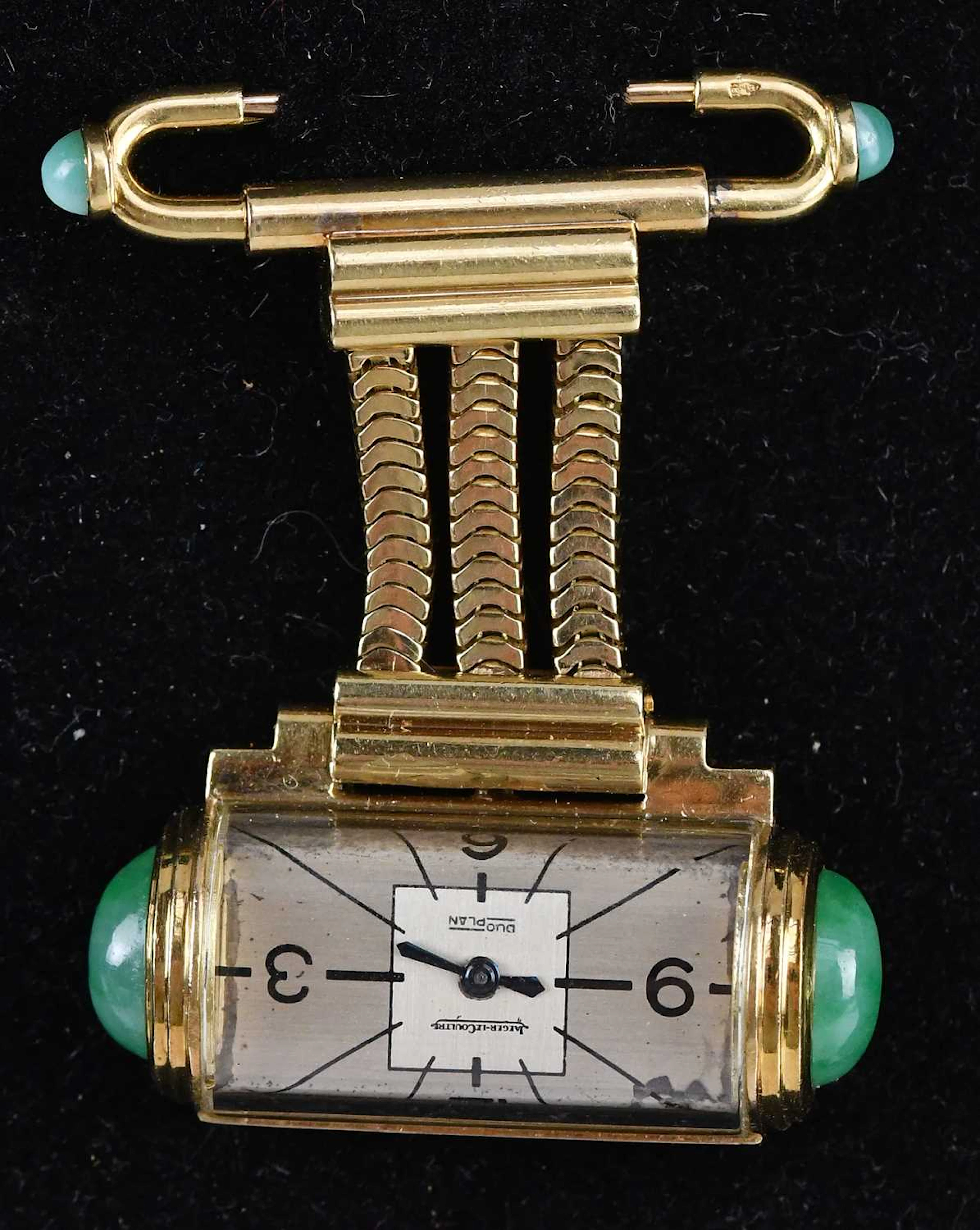 JAEGER LE COULTRE; an 18ct gold Duoplan fob/pendant watch with jade cabochons