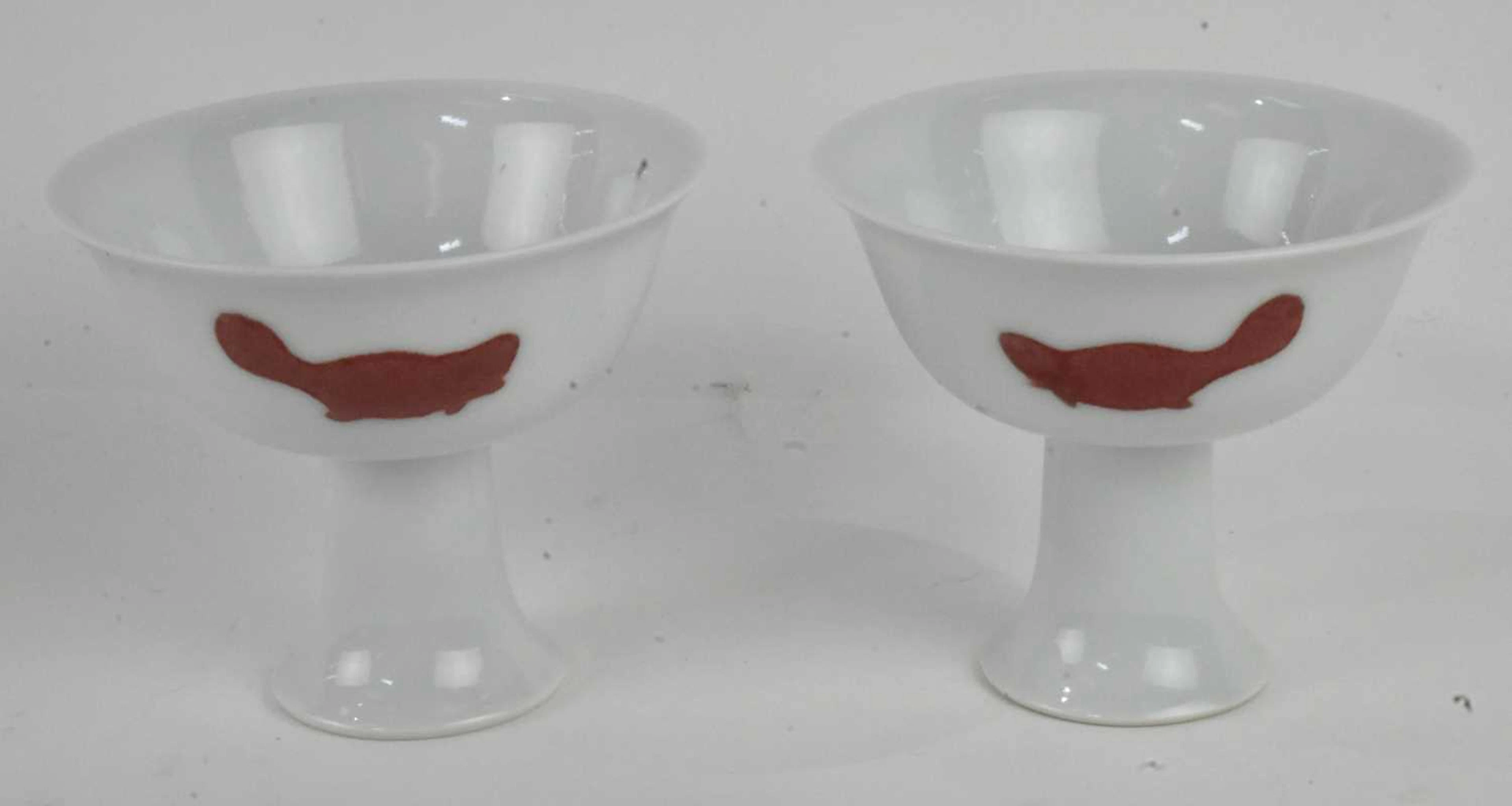 Two modern Chinese porcelain red copper decorated Ming dynasty style stem cups