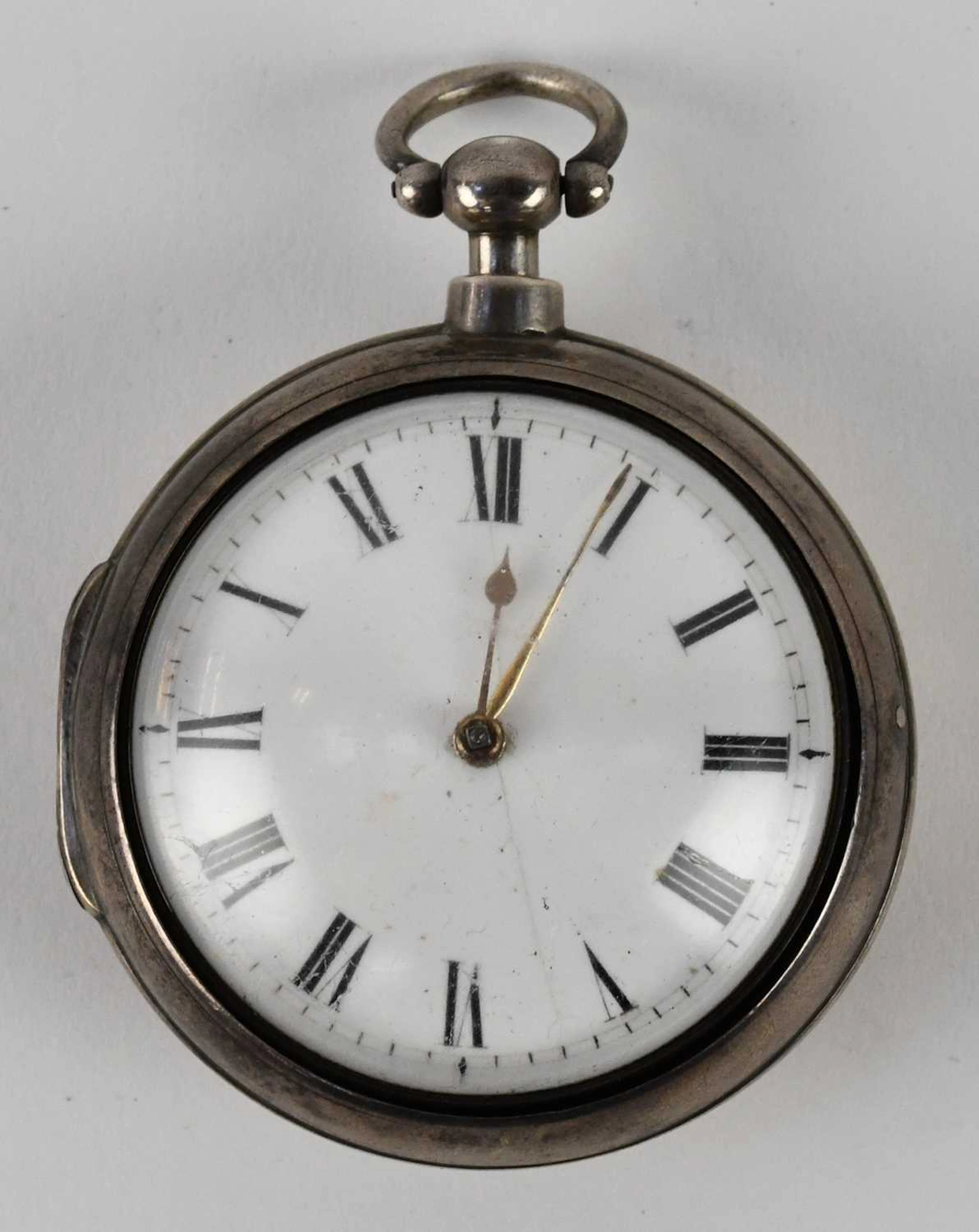 A George III hallmarked silver cased open face pair cased key wind pocket watch