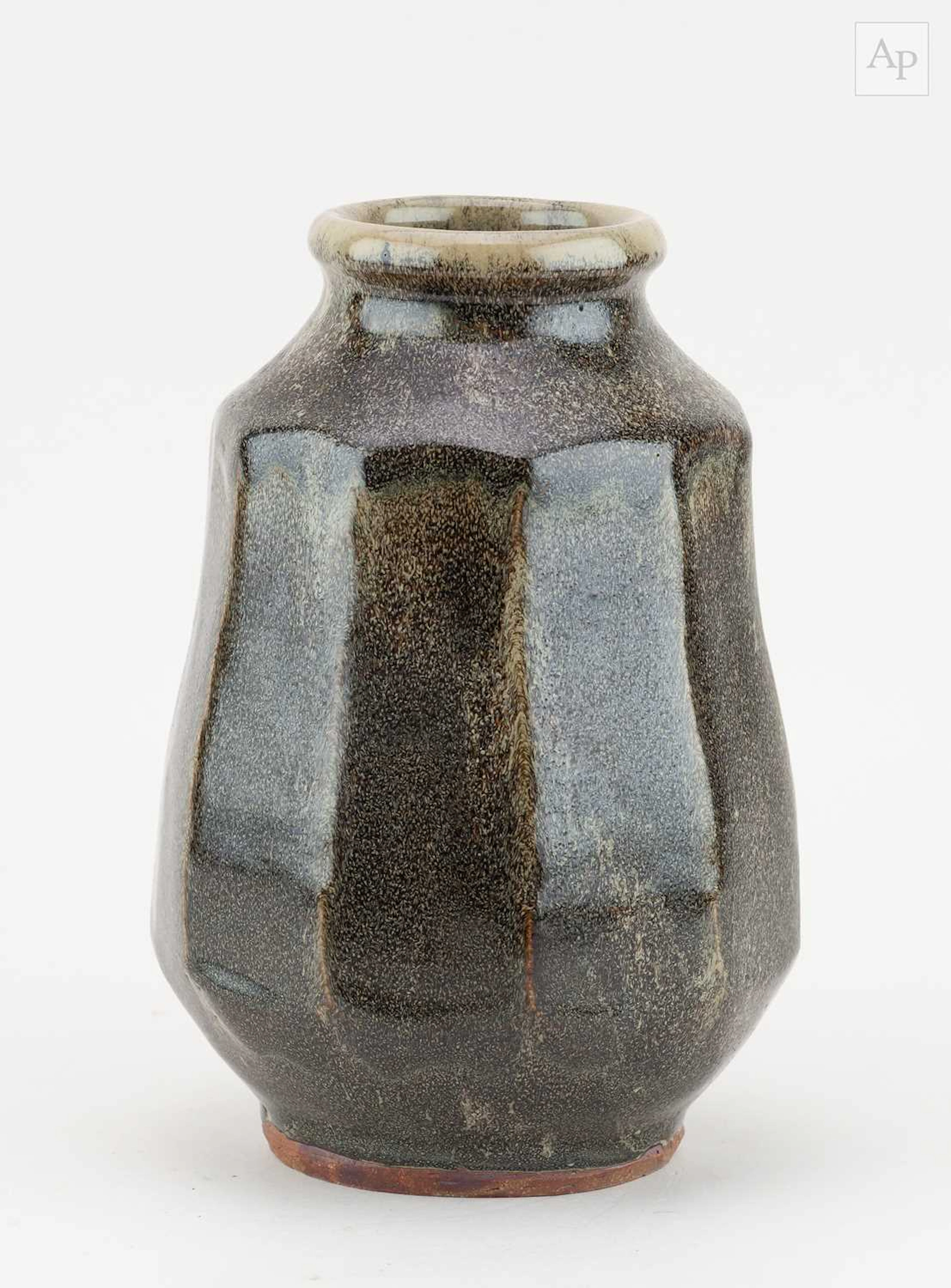 MIKE DODD (born 1943); a faceted stoneware vase covered...