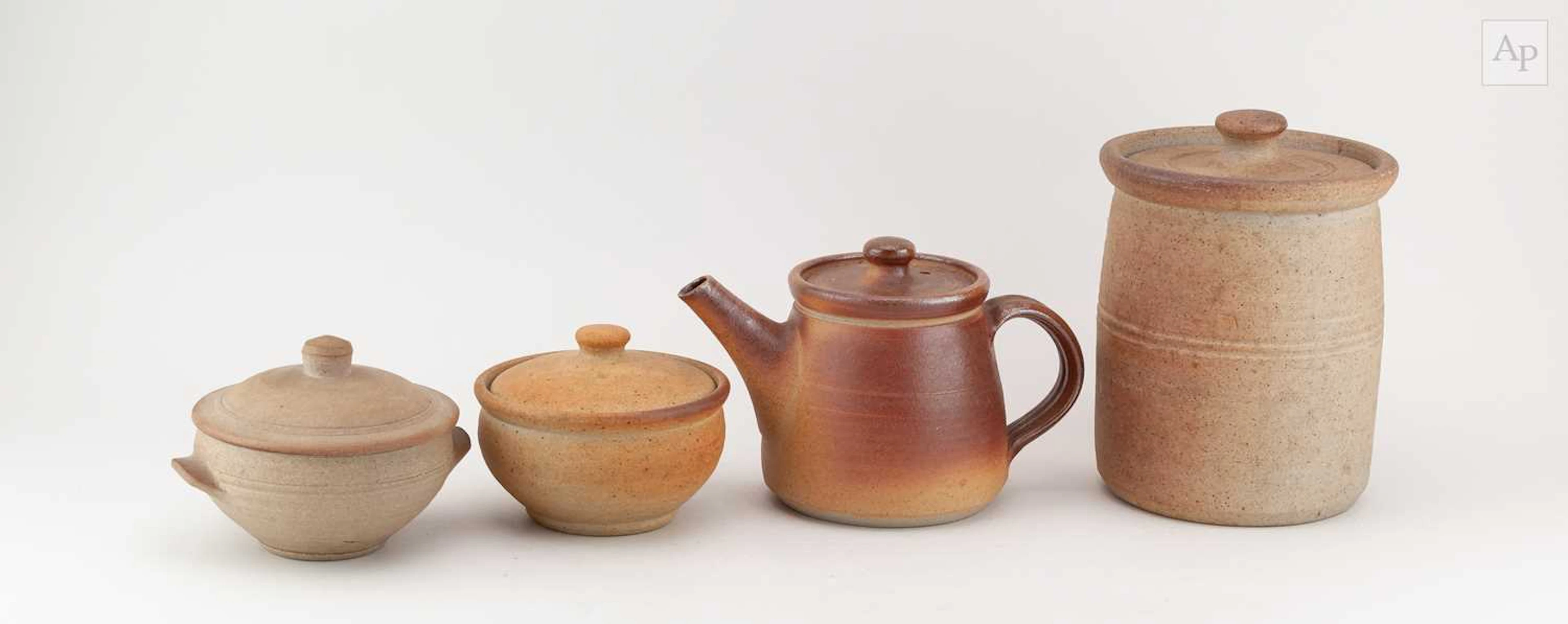 Muchelney Pottery; a stoneware teapot with toasted unglazed exterior