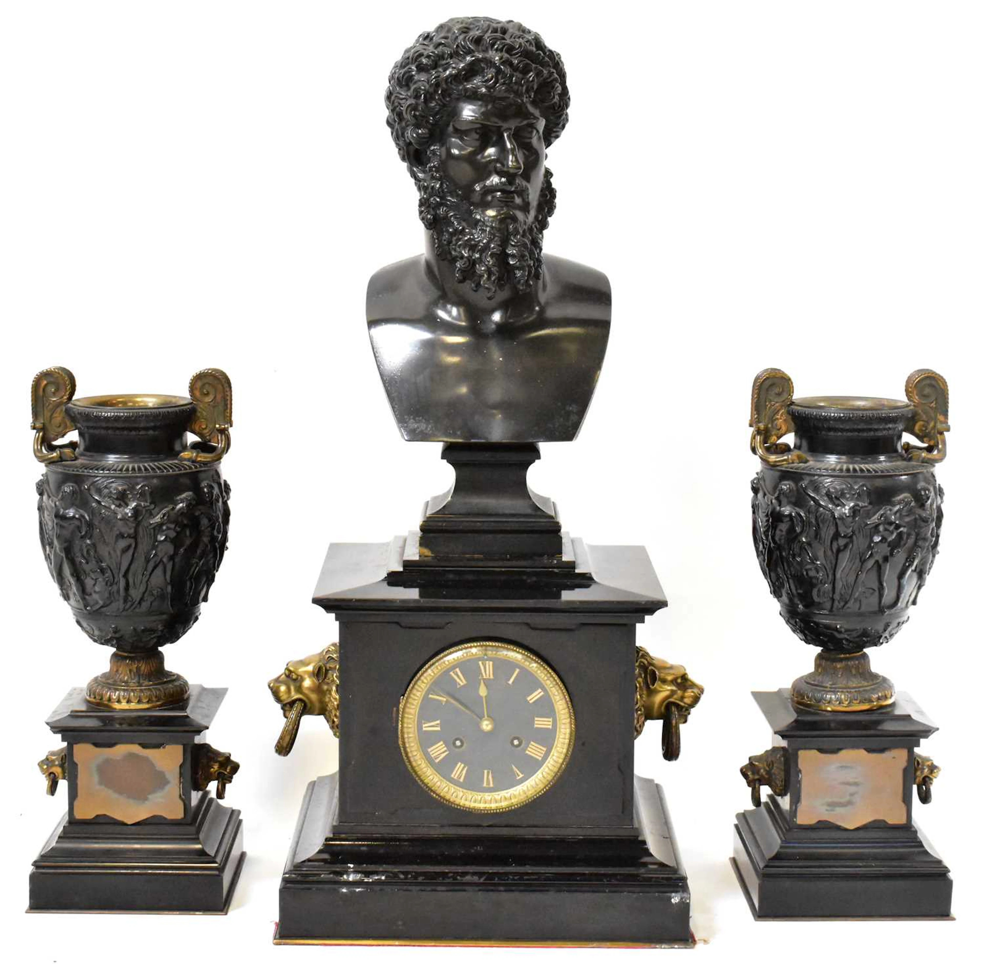 An impressive Victorian slate and bronze clock garniture
