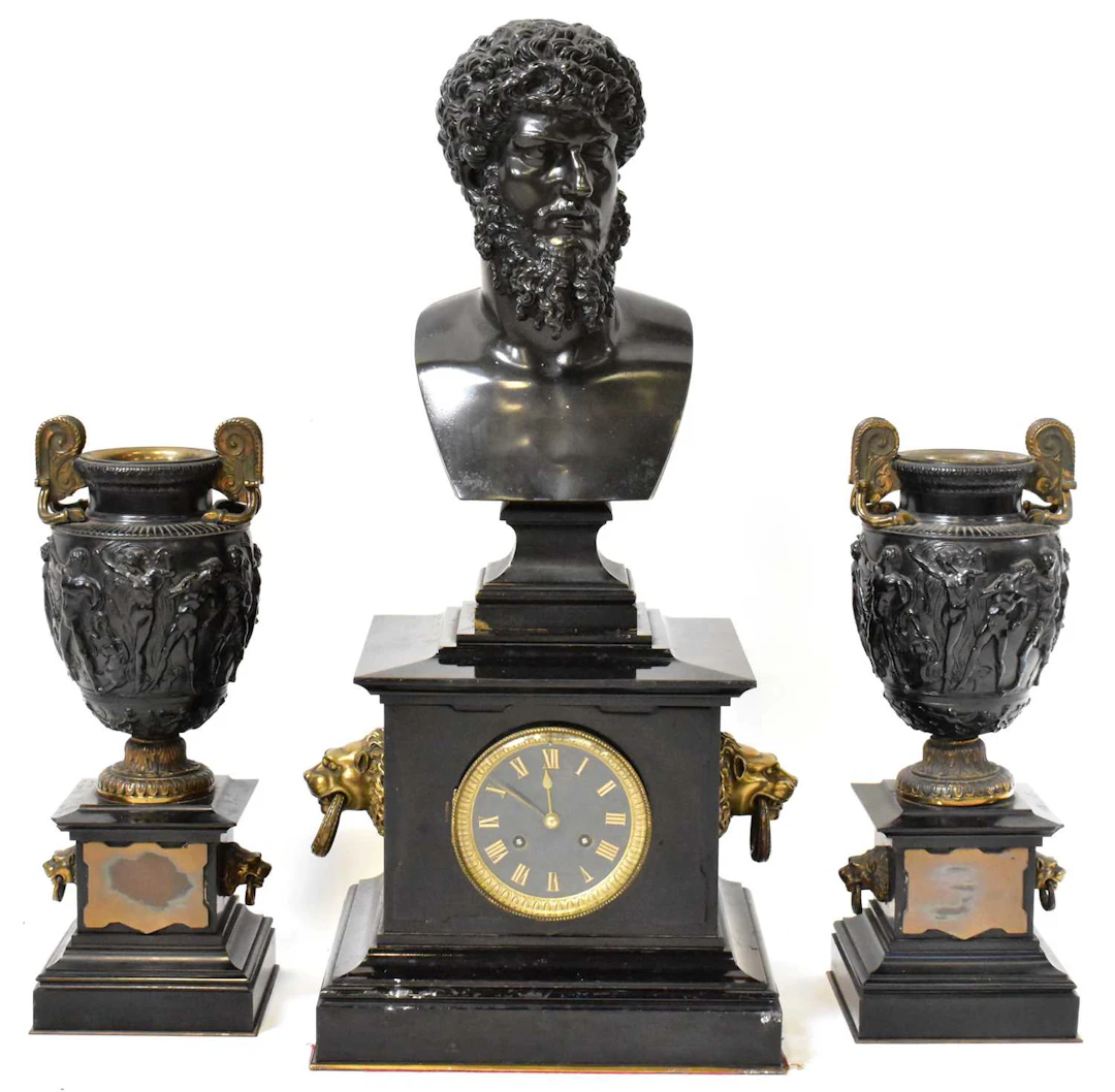 An impressive Victorian slate and bronze clock garniture