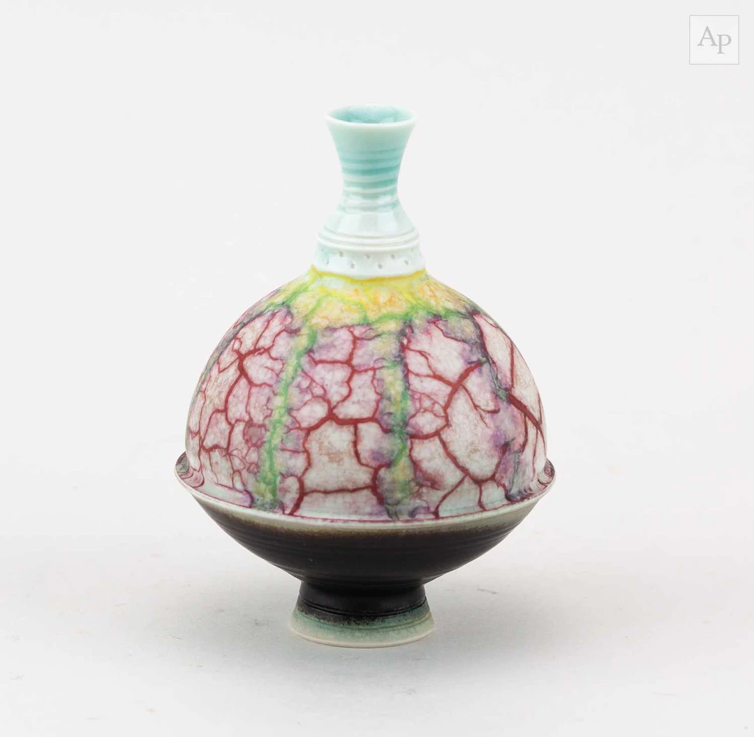 GEOFFREY SWINDELL (born 1945); a porcelain bottle covered...