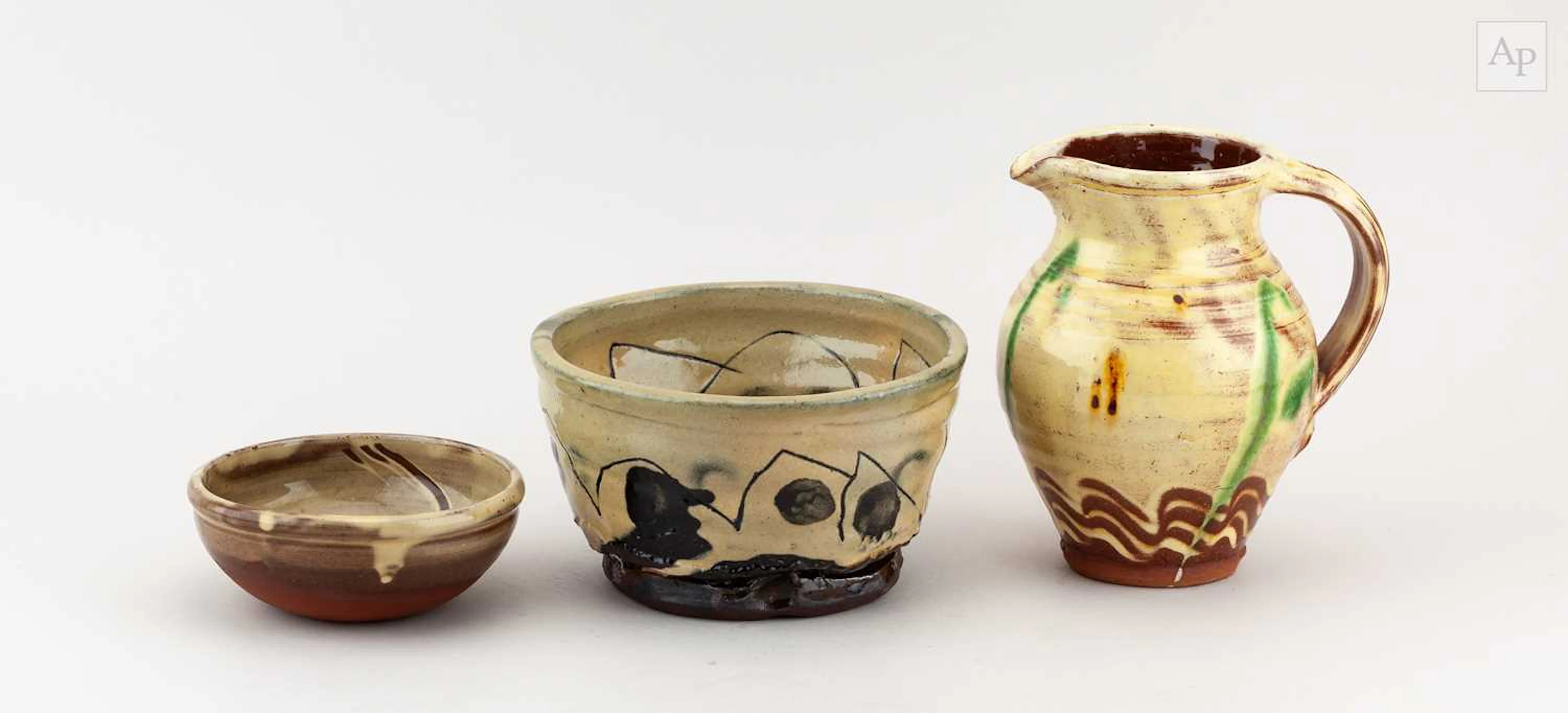 CLIVE BOWEN (born 1943); a slipware jug with trailed and...