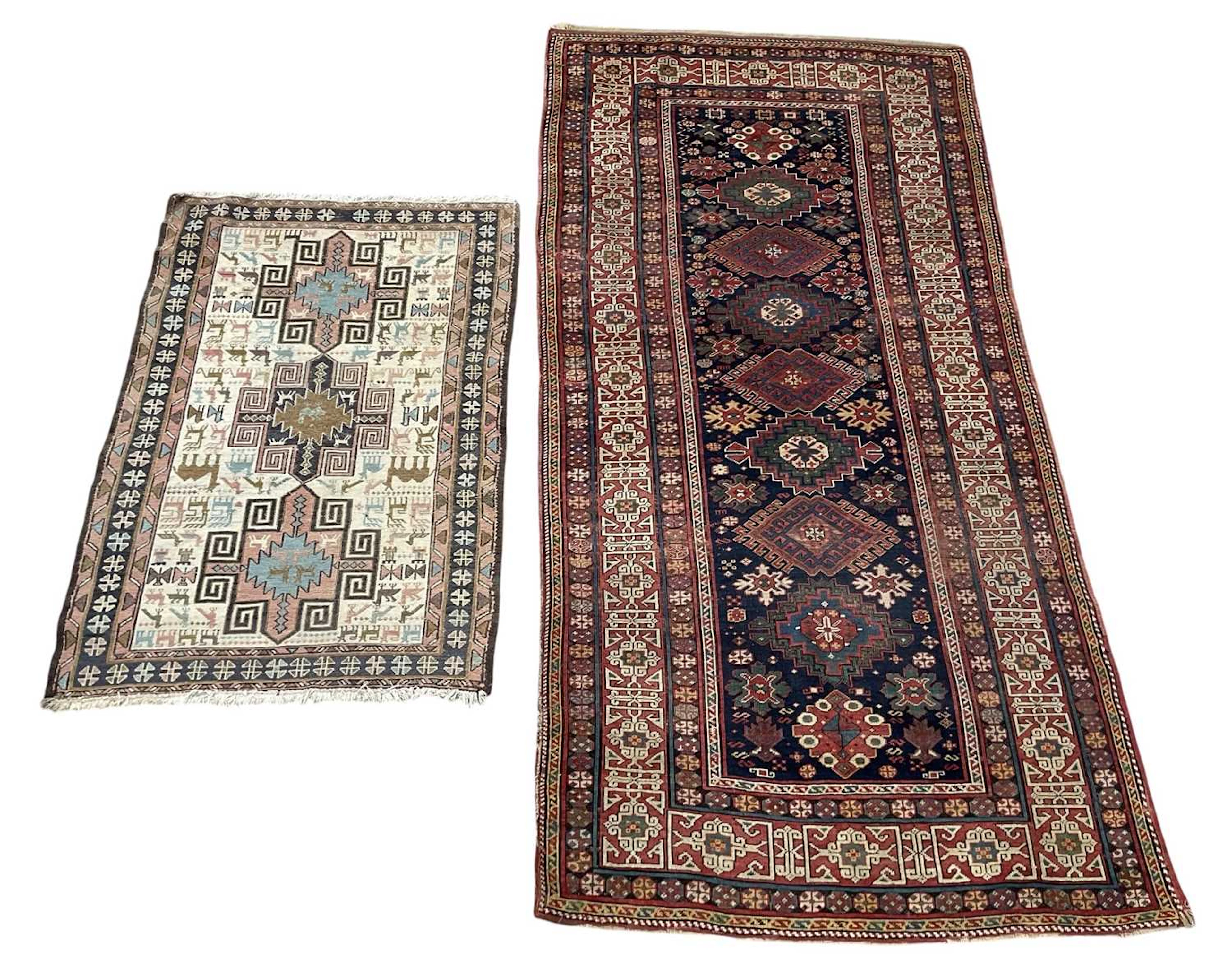 Two vintage hand woven red ground carpets