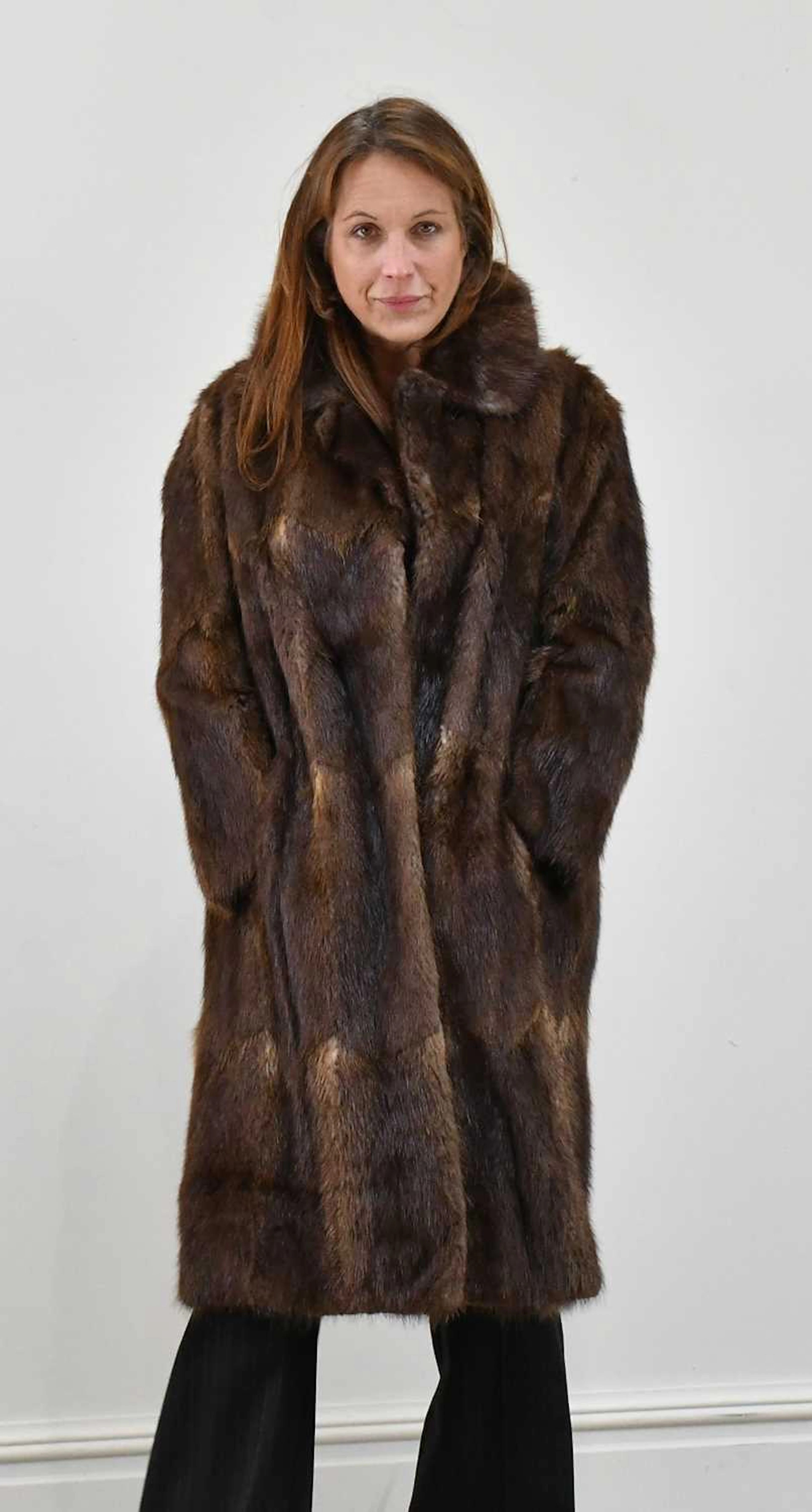 A full-length musquash fur coat