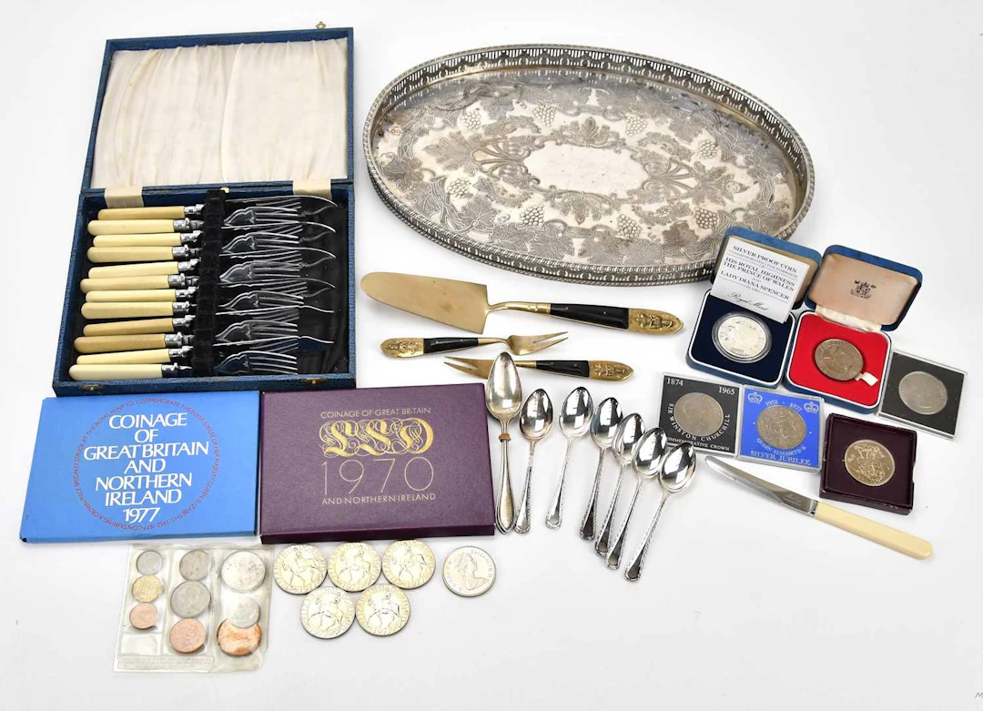 A collection of silver plate and assorted coins