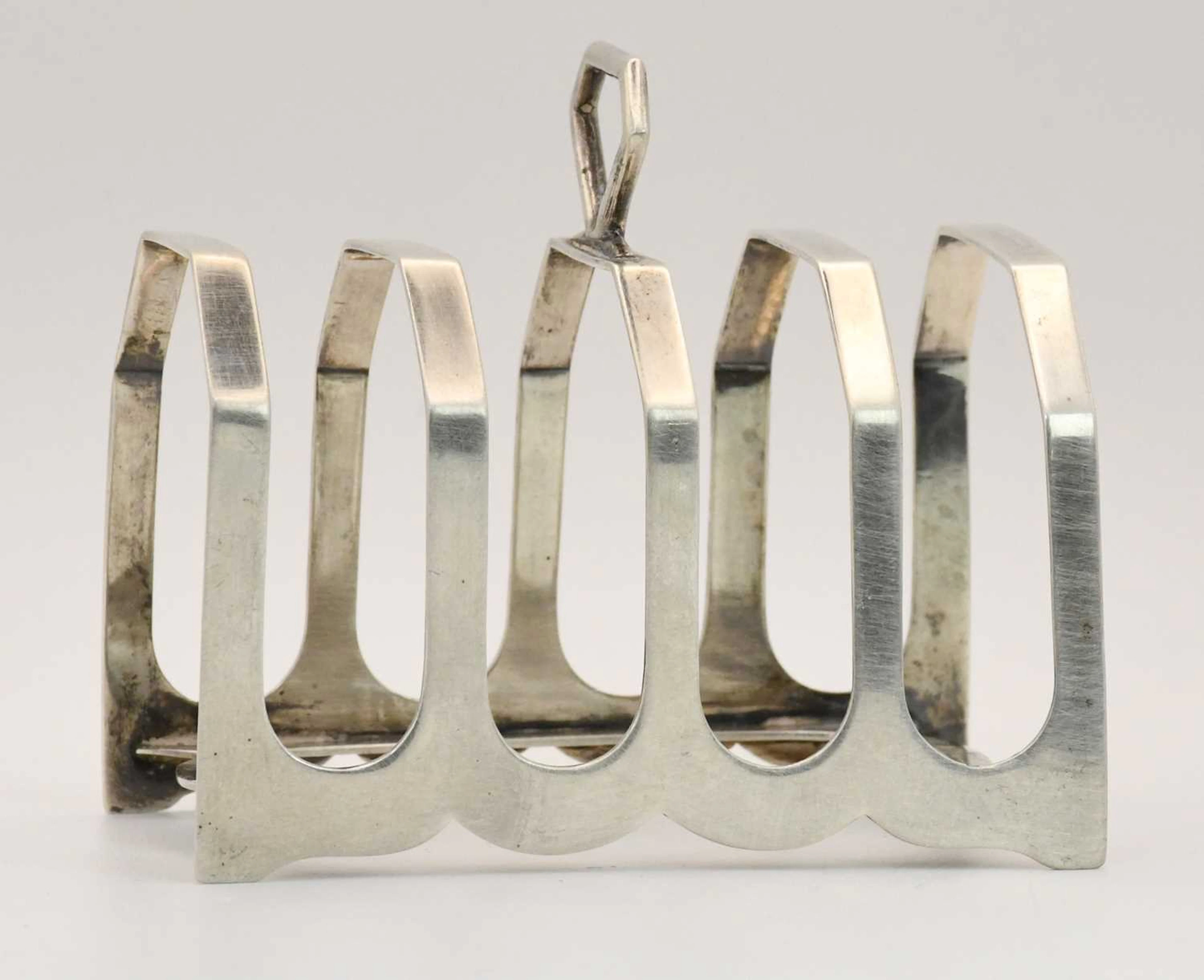 HARRISON BROTHERS & HOWSON; a George V hallmarked silver toast rack