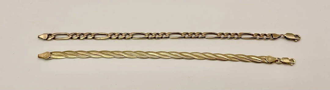 A 9ct yellow gold Figaro link bracelet