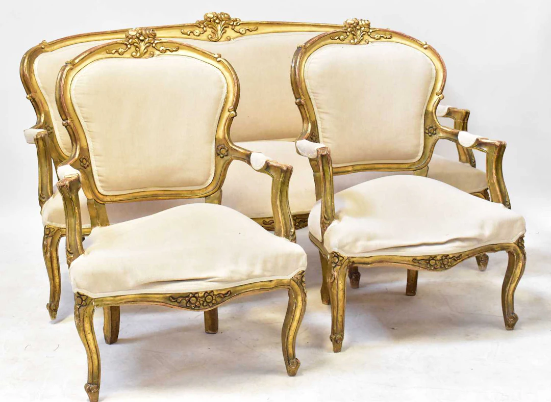 A 19th century Louis XV style giltwood three-piece suite...