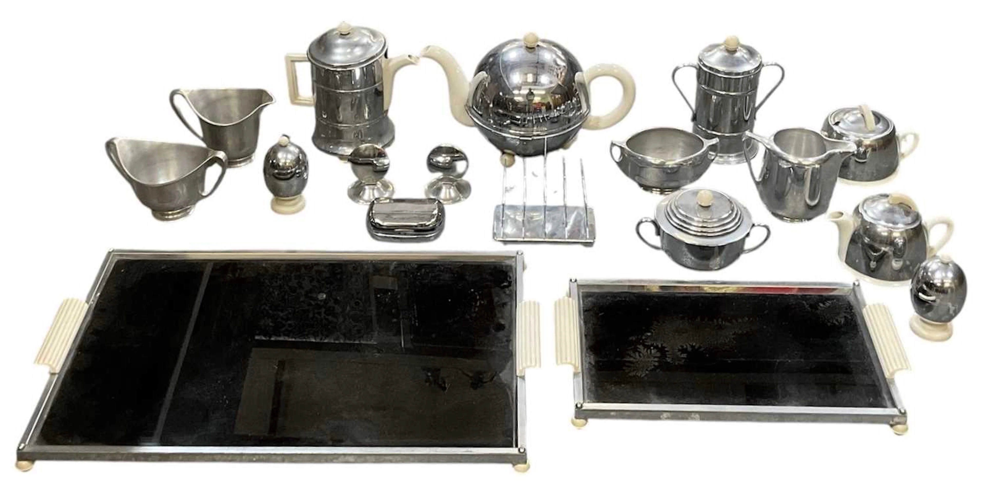 A quantity of mid century stainless steel tableware