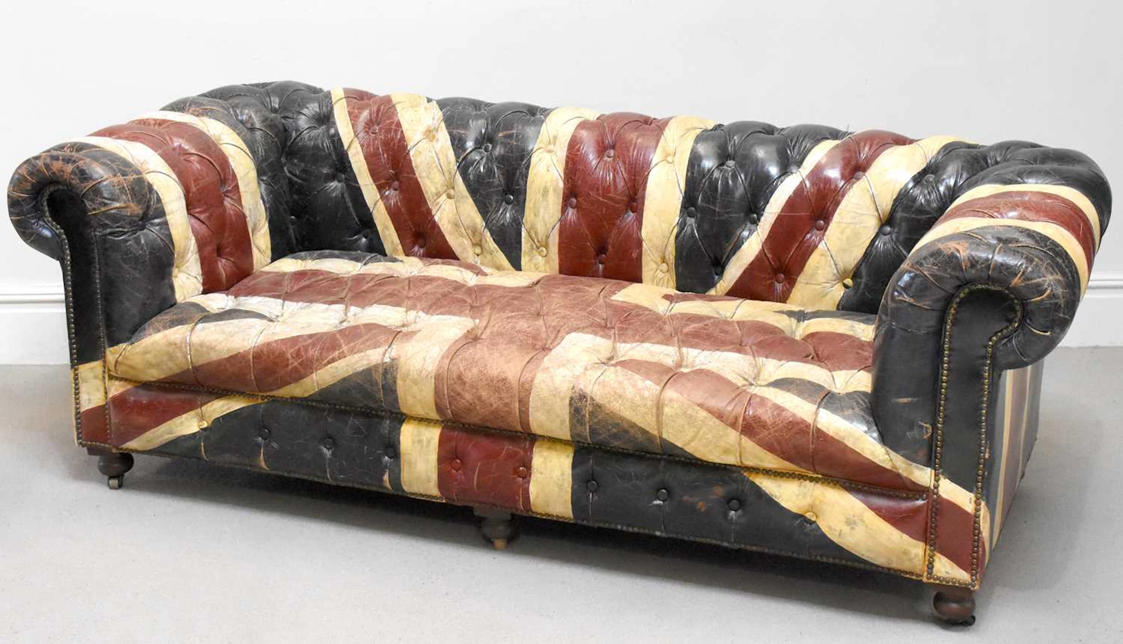 ANDREW MARTIN; a Union Jack Chesterfield sofa