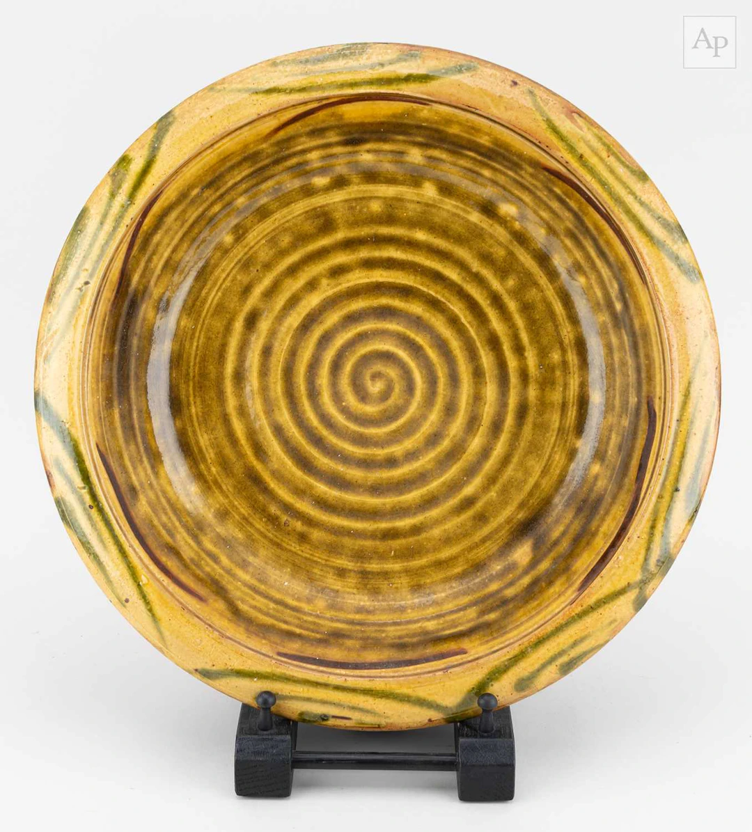 CLIVE BOWEN (born 1943); a large slipware dish with...