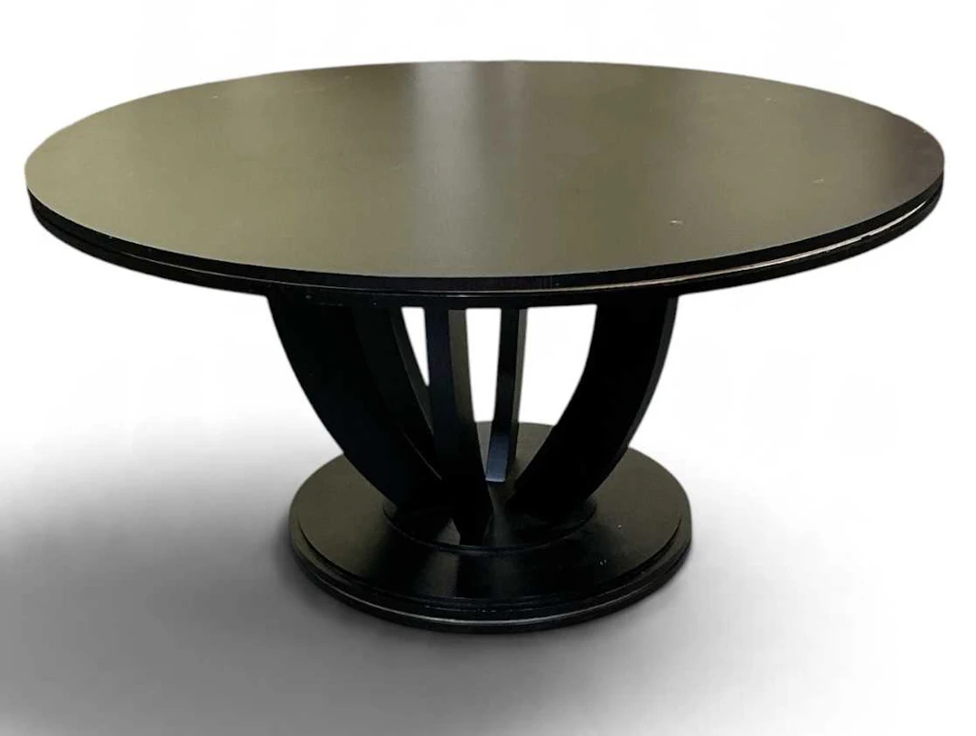 A large modern contemporary circular topped ebonised dining table