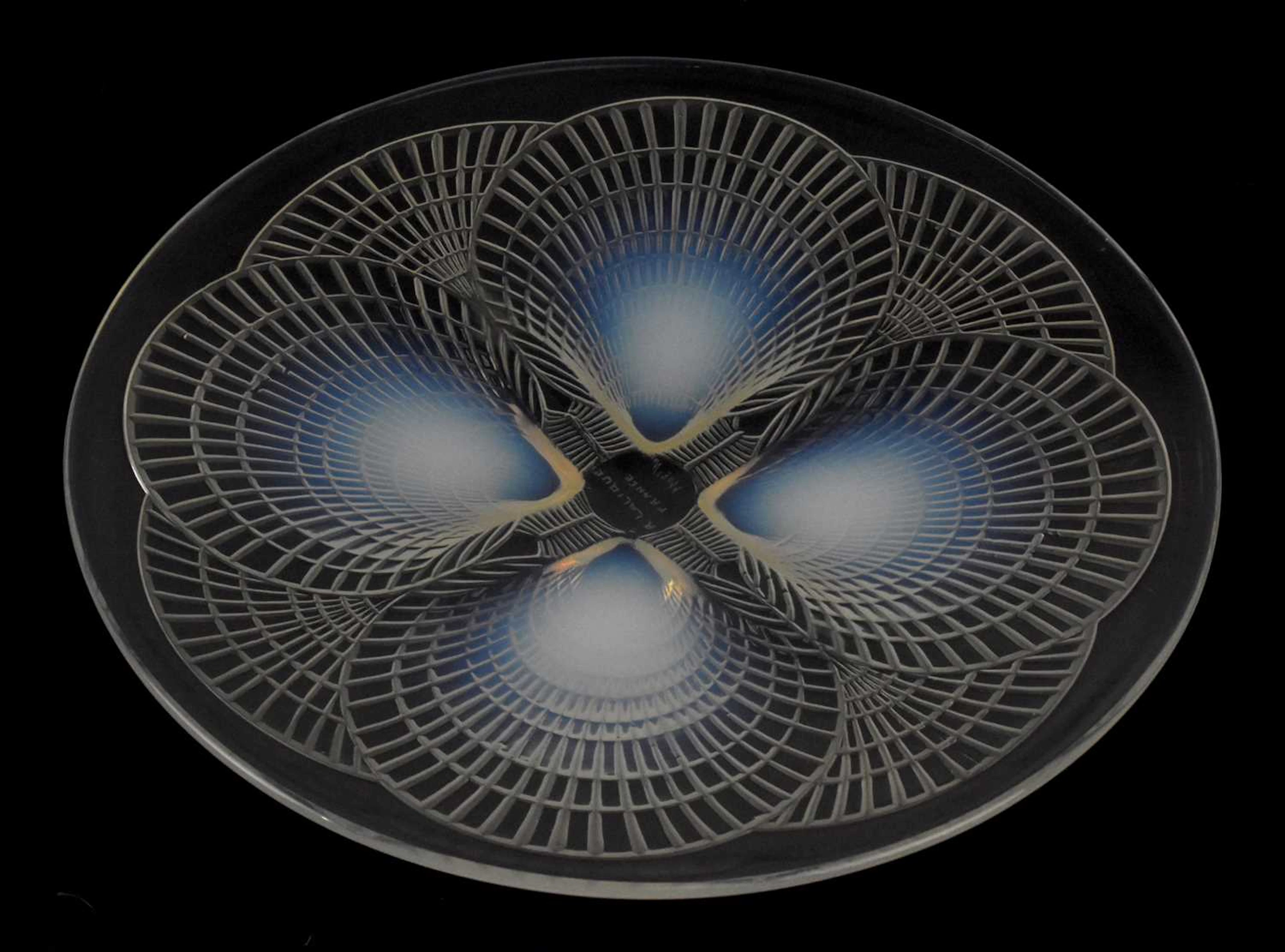 RENÉ LALIQUE; a clear and opalescent glass dish