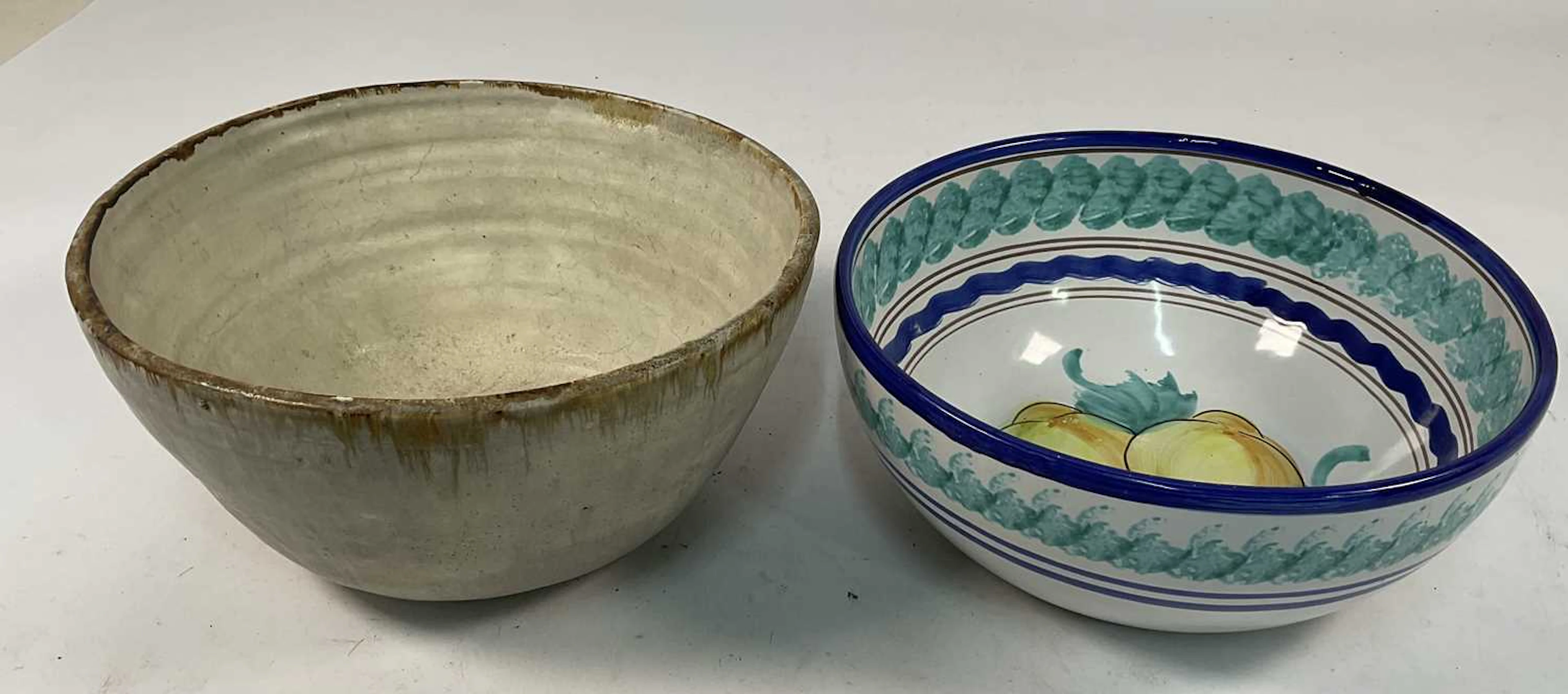 A studio ceramic bowl with drip glaze