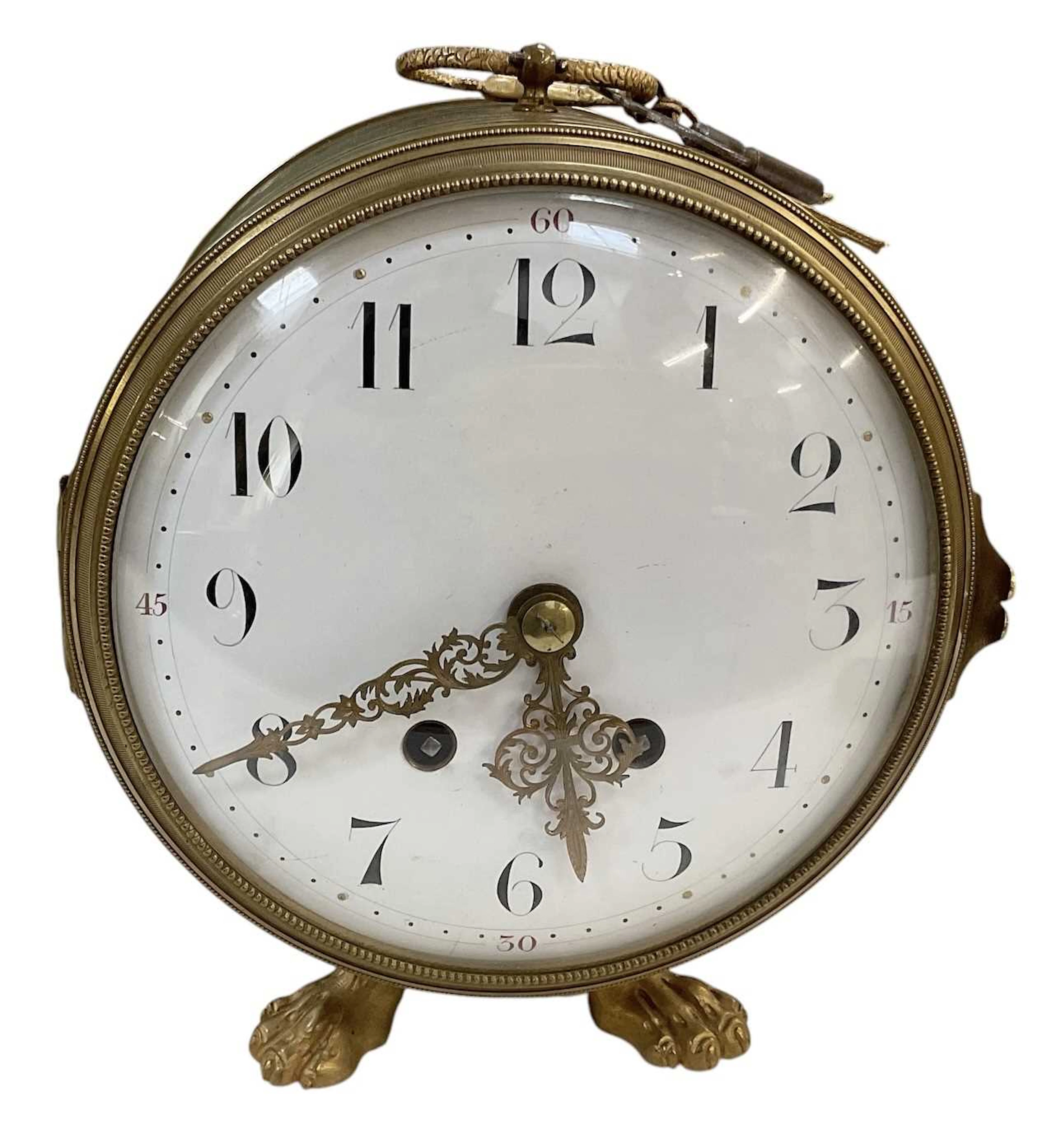 A late 19th century French gilt brass drum clock