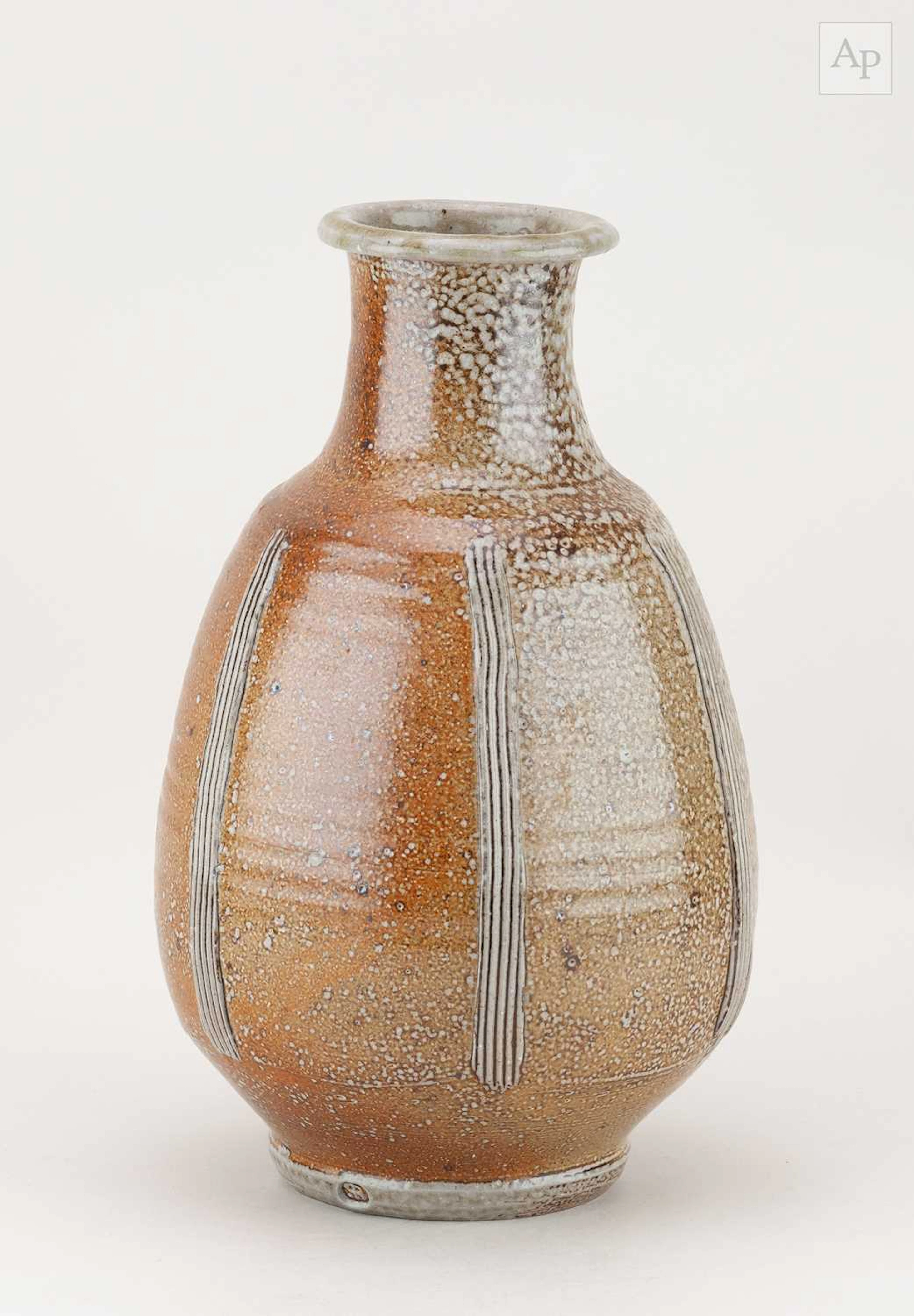 PHIL ROGERS (1951-2020); a salt glazed bottle with applied incised decoration