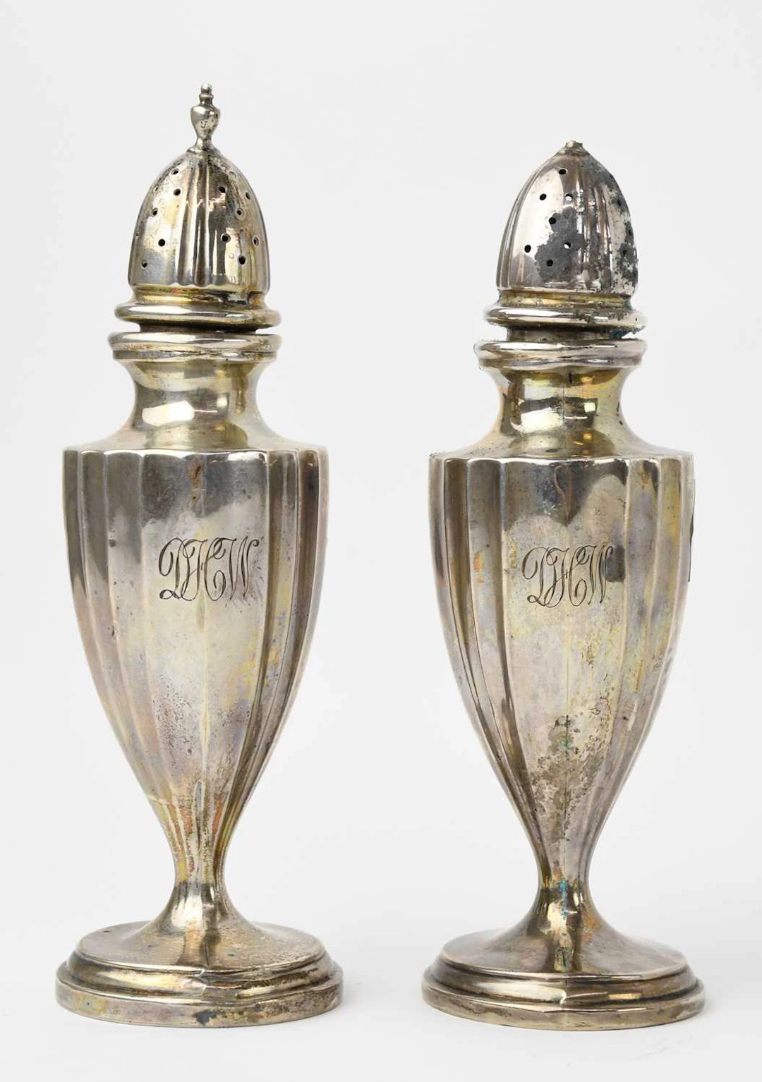 A pair of early 20th century sterling silver salt and pepper shakers