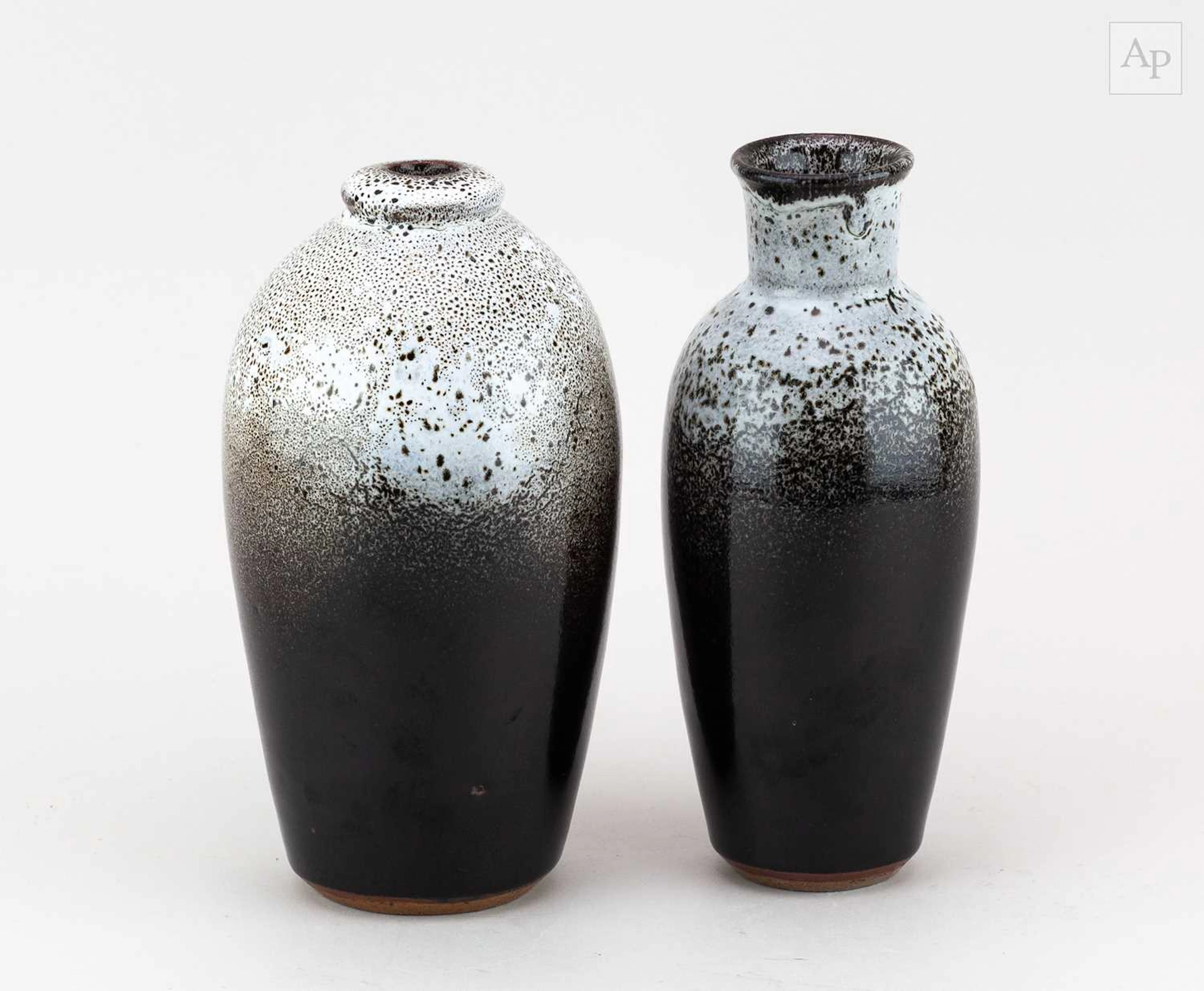 STANLEY SELLERS (1933-2013); two stoneware bottles...