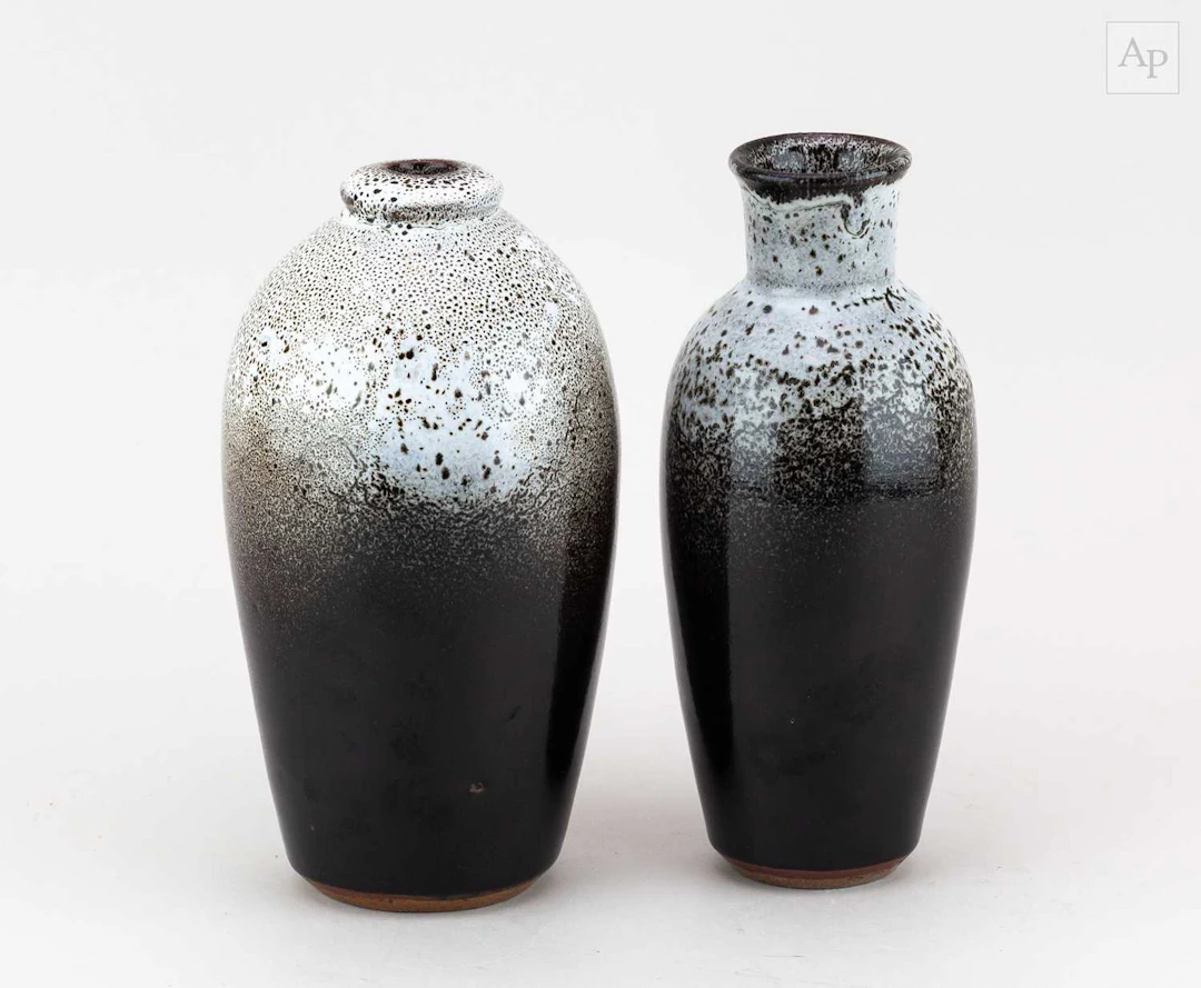 STANLEY SELLERS (1933-2013); two stoneware bottles...